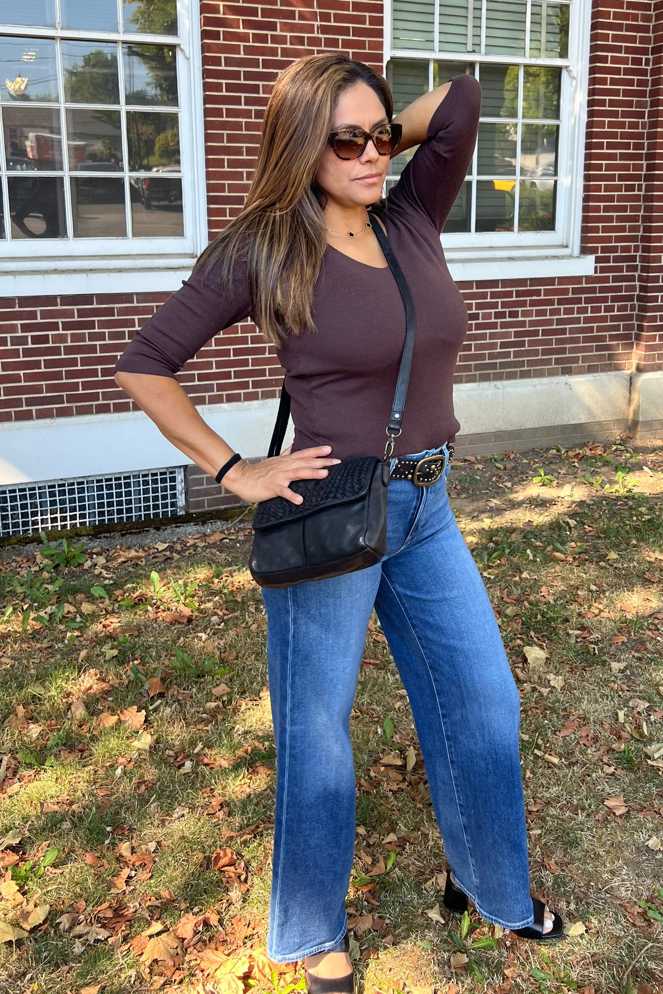 Crafted in our iconic shine fabric, the subtle sheen makes this top a chic day-to-night style. It features a delicate v-neckline and ¾ sleeves. The front is double-layered for a more weighty feel. Wear yours with a midi skirt or pants.