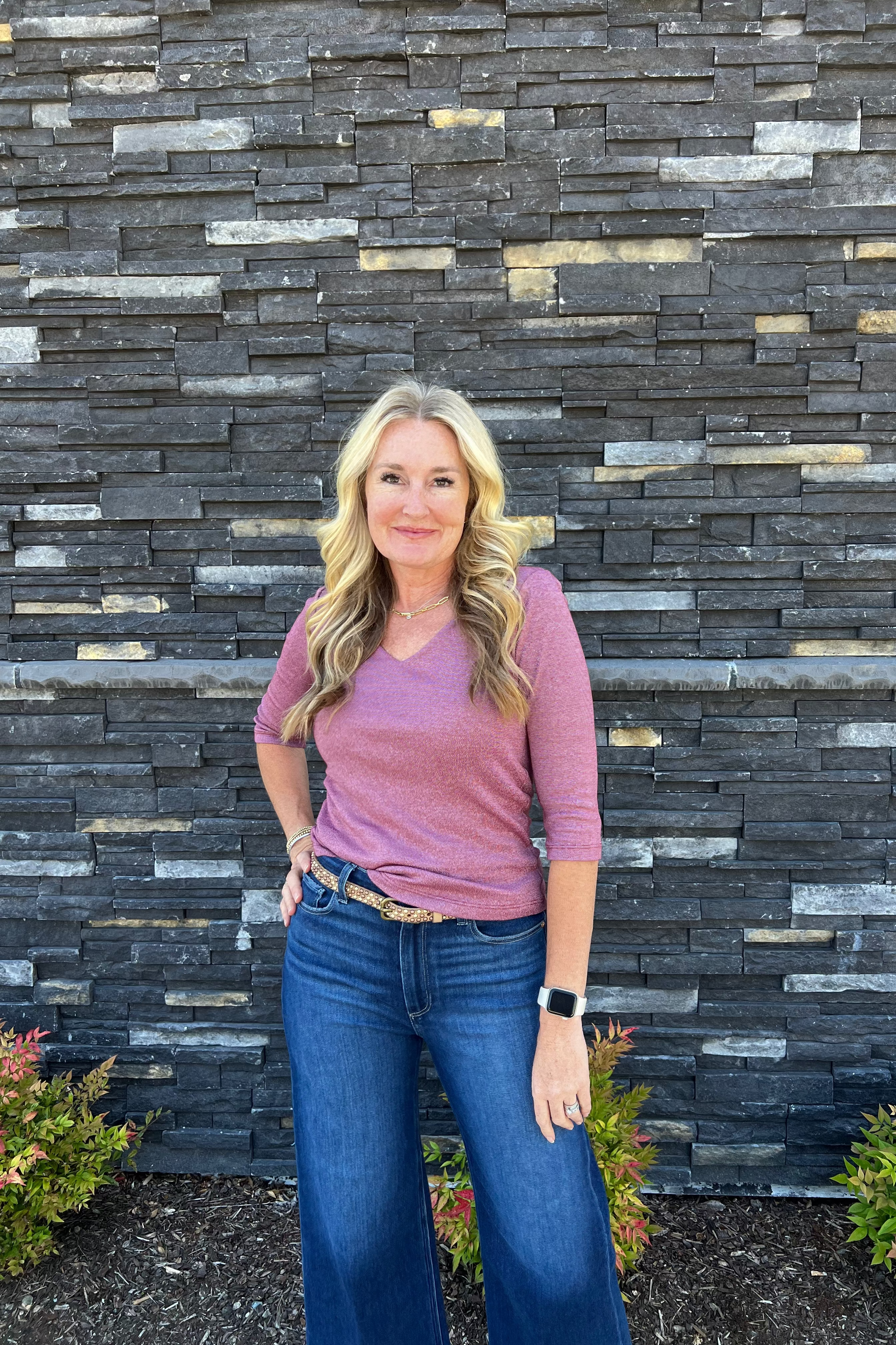 Crafted in our iconic shine fabric, the subtle sheen makes this top a chic day-to-night style. It features a delicate v-neckline and ¾ sleeves. The front is double-layered for a more weighty feel. Wear yours with a midi skirt or pants.