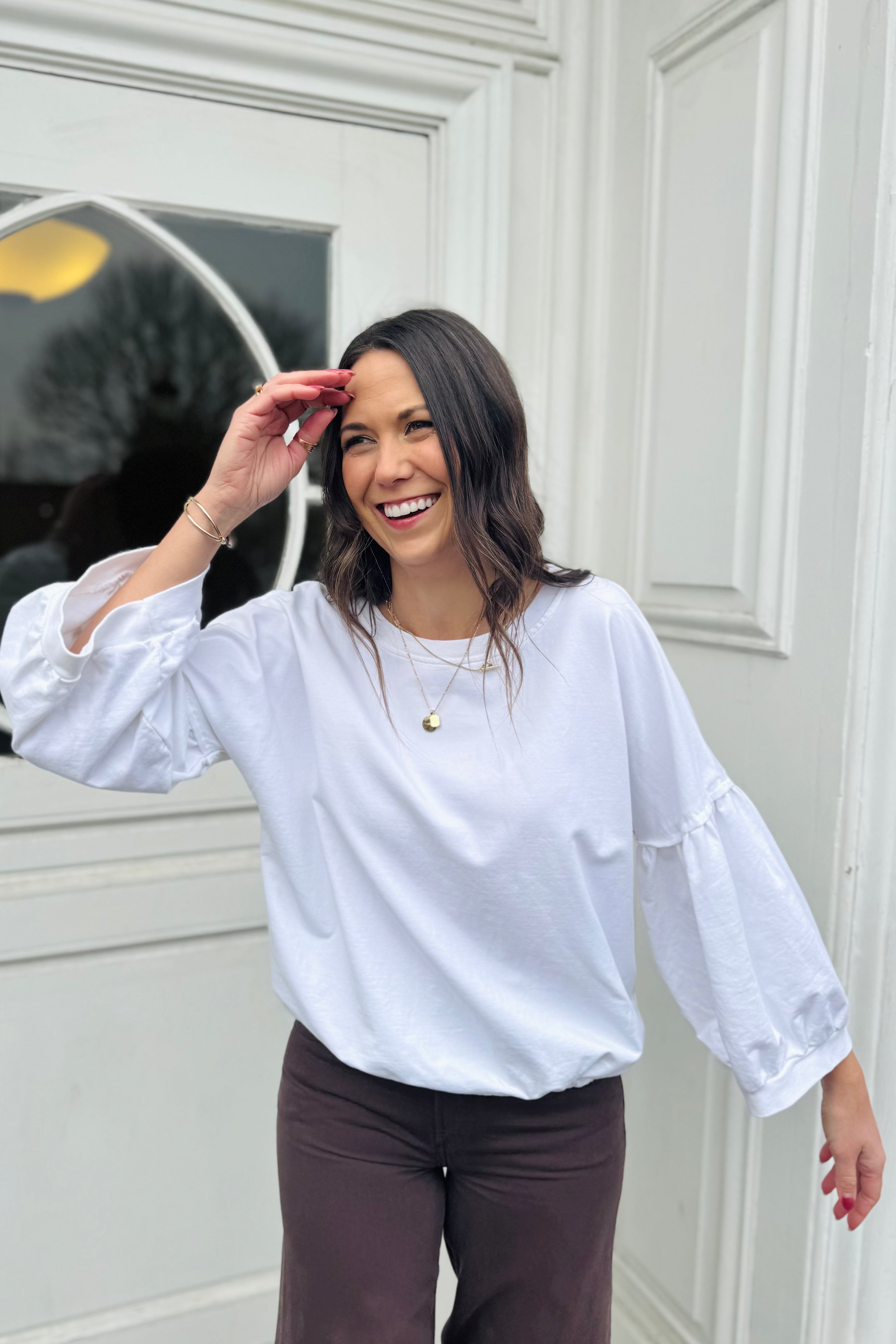 Experience comfort and style with the Bo Bubble Sleeve Sweatshirt. Designed with trendy bubble sleeves and a practical drawstring hem, this sweatshirt offers a flattering fit and cozy feel. Perfect for lounging or casual outings, it combines relaxed comfort with a fashionable edge to elevate your everyday wardrobe.