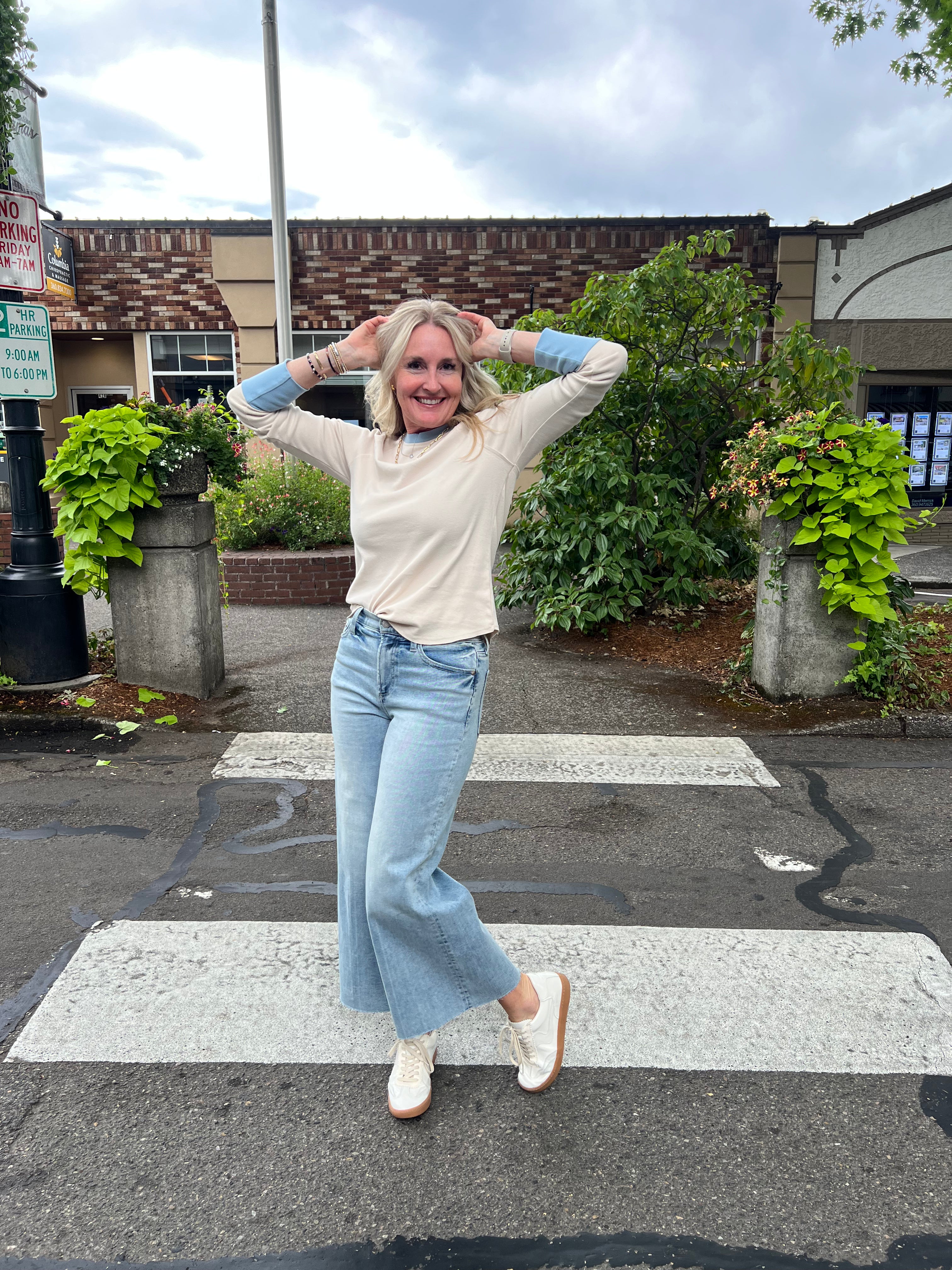 The Contrast Rib Raglan top offers an ideal layering piece to smoothly shift your wardrobe from winter to fall, featuring baby blue accents on the neckline and sleeves for a distinctive look.