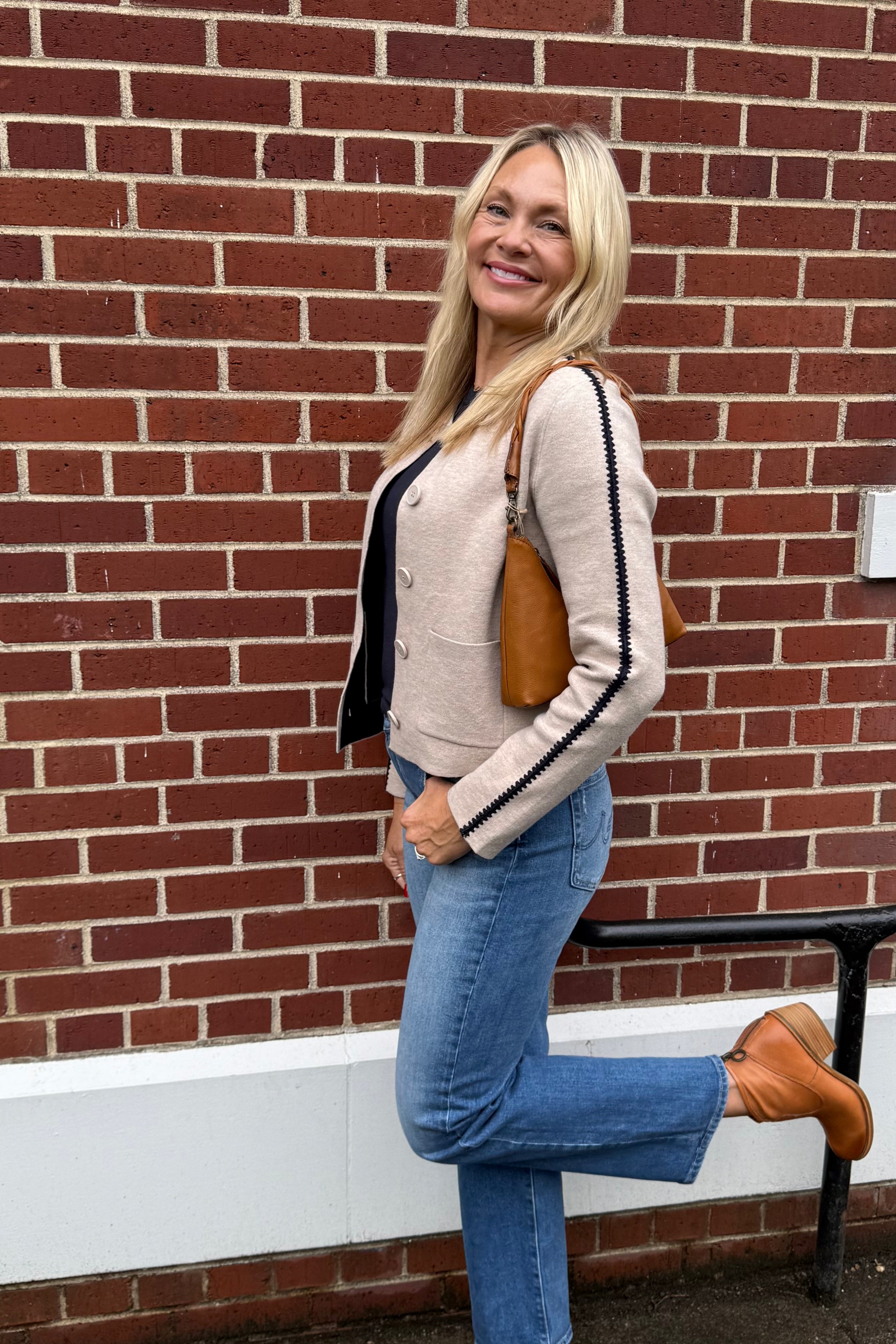 Level up your layers in this double sided knit jacket with a sporty stripe on the side and blanket stitch detailing at the cuff. Blending modern style with anytime versatility and all day comfort, the Knit Bomber Jacket is the layer you can't help but love. Perfect layered over dresses or paired with pants and denim for an elevated, effortless look.