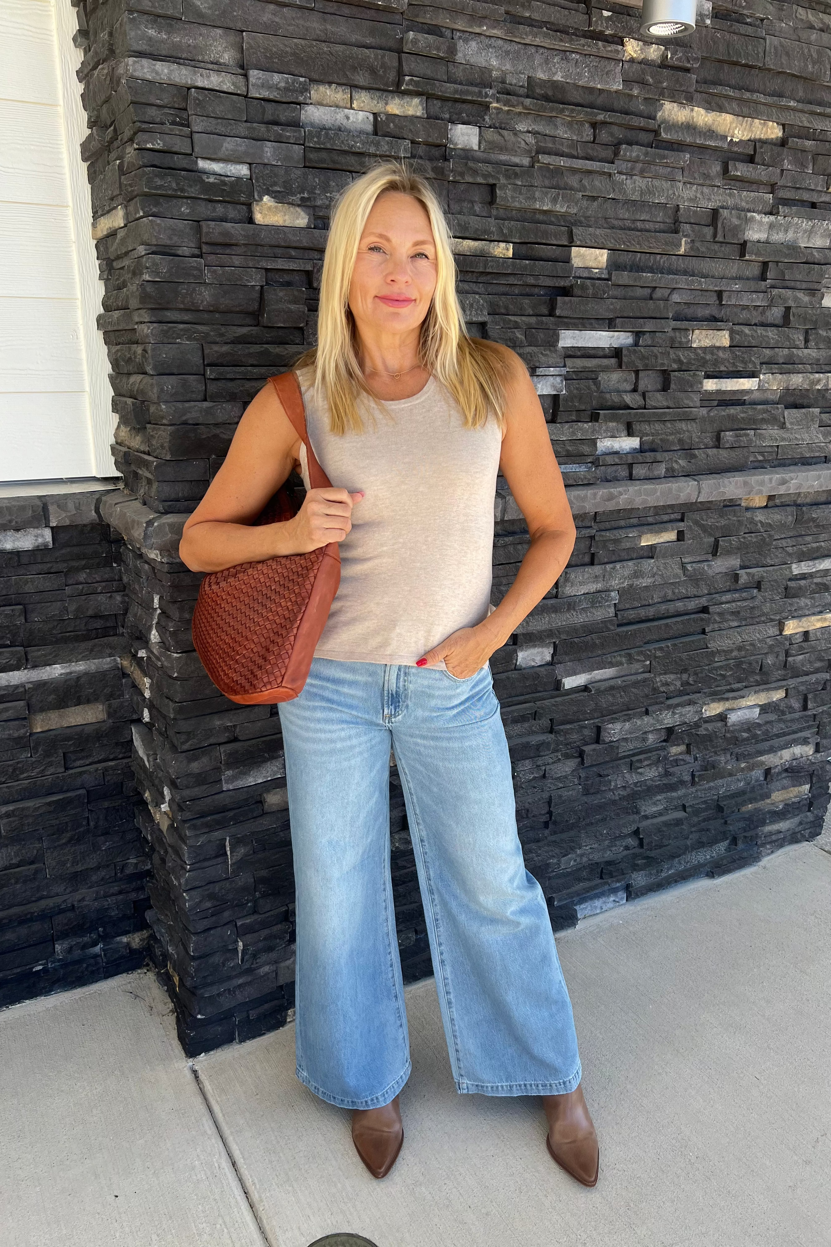 Enhance your next adventure with the Pure Amici Tank. This sophisticated top pairs perfectly with the matching cardigan and can be styled with either jeans or dress pants for a truly elevated ensemble.