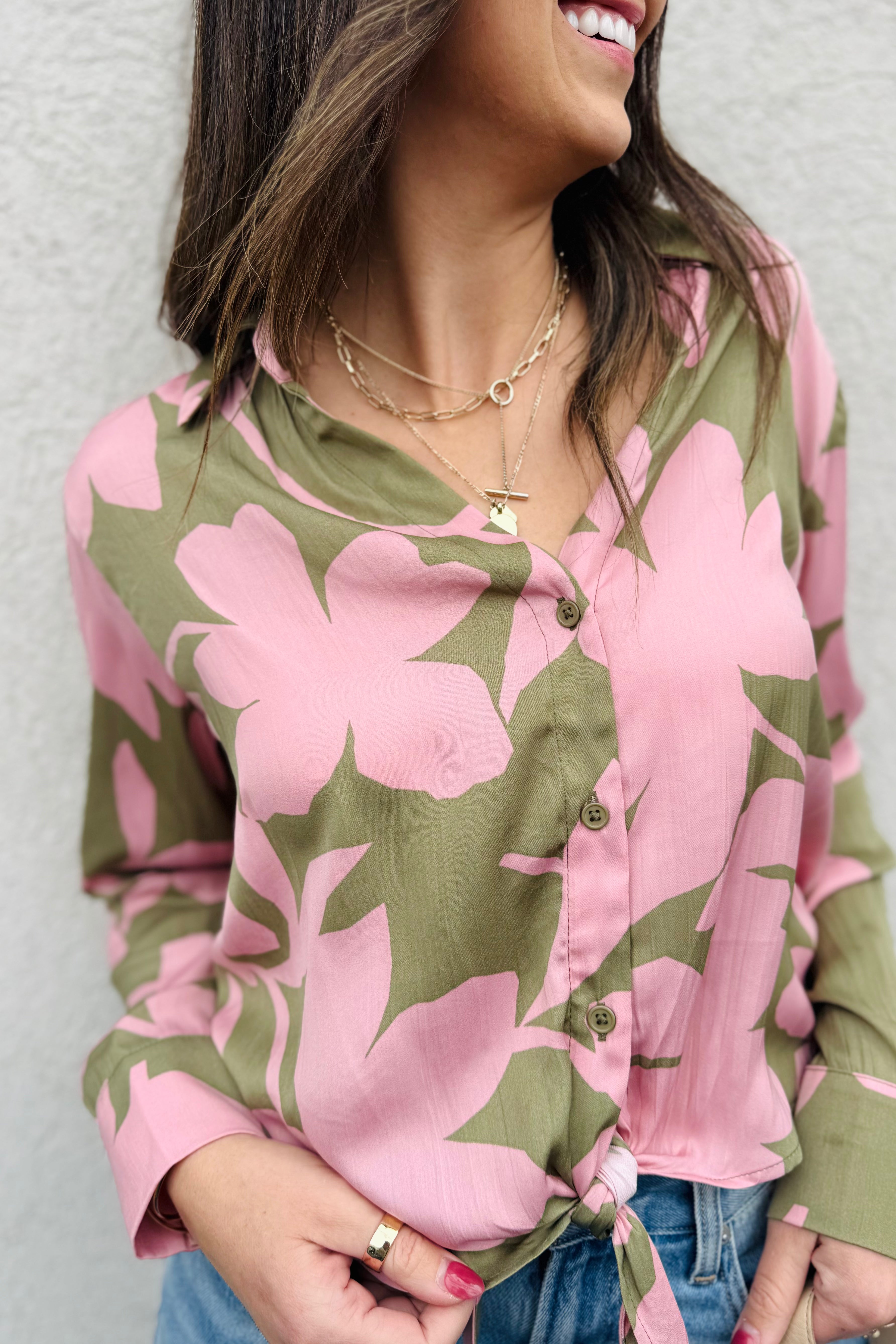 This is the perfect blouse for a date night, Holiday or Vacations! Love this green and Pink Combo with w button down front and tie! So many outfit options
