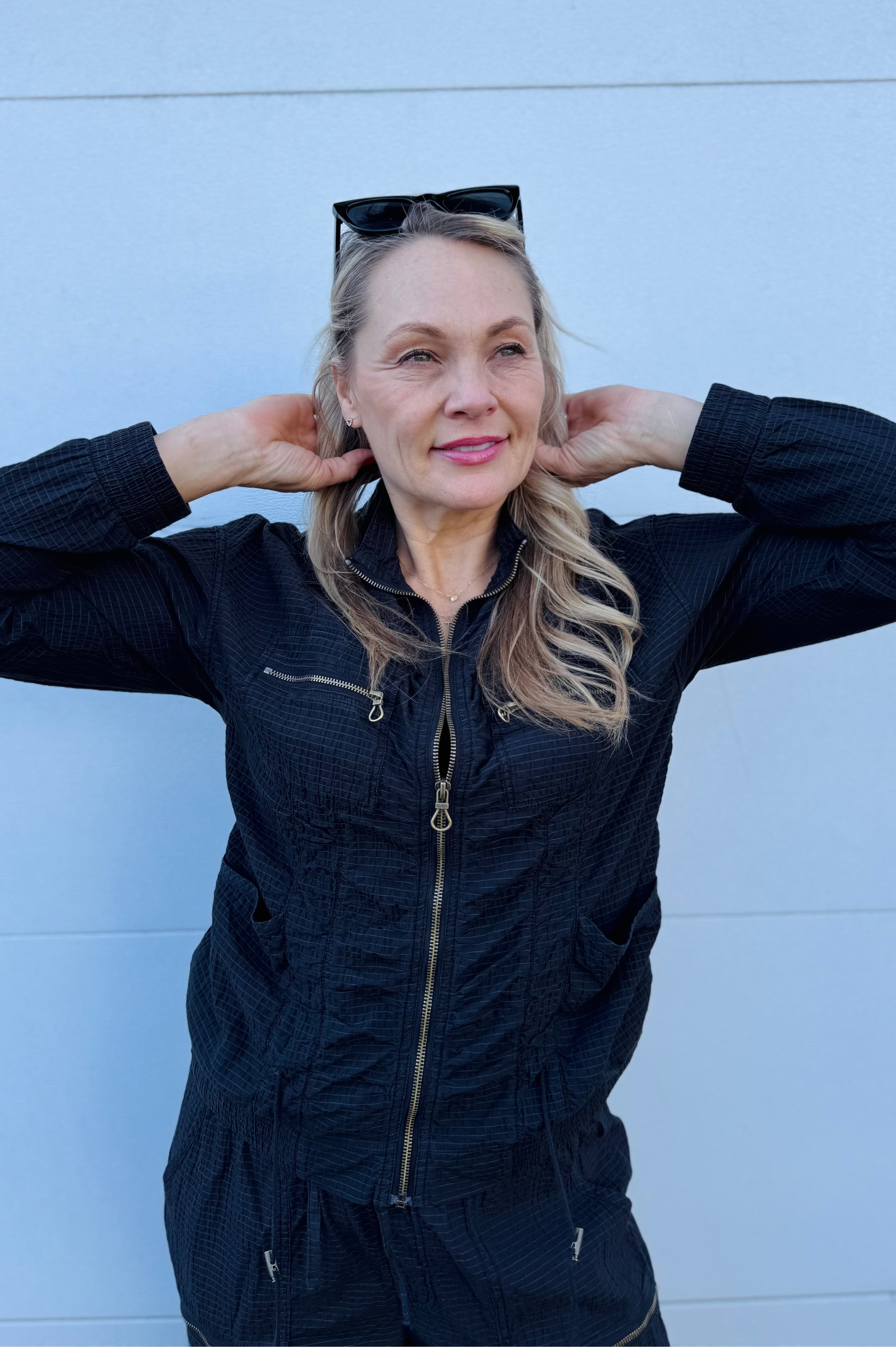 Wear this out and about or on the plane. A perfect travel outfit that combines comfort and style. The gold details add a touch of girlyness and the perfect balance of sporty and chic.