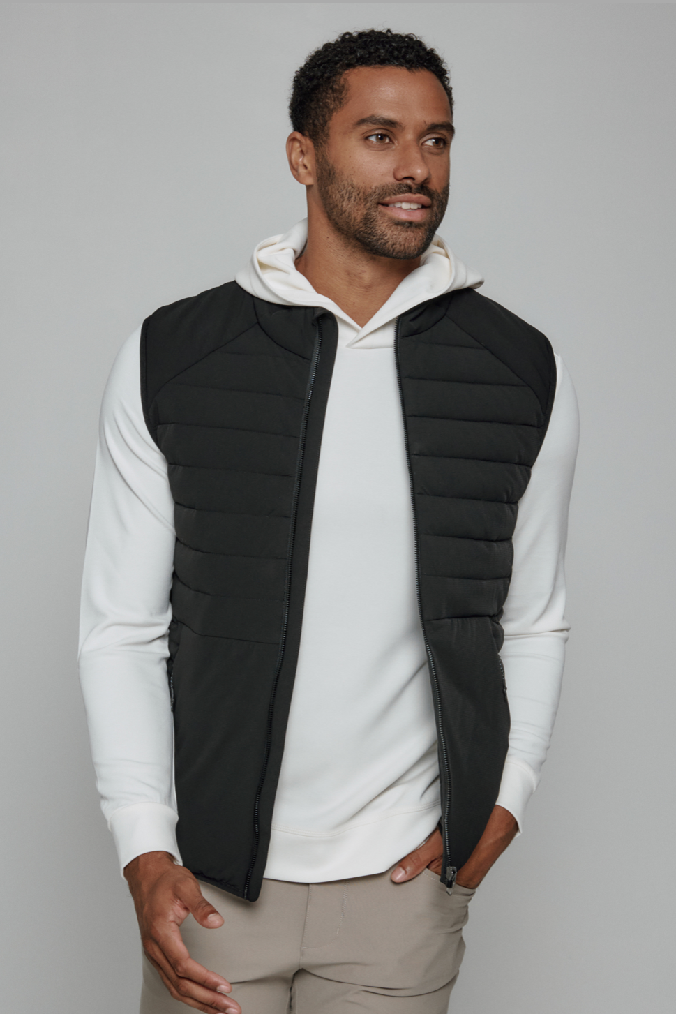 7 Diamonds Atlas vest in Black, a lightweight, easy-layering vest that adds warmth over a polo or quarter zip for golf mornings, travel days, the office and crisp fall weekends