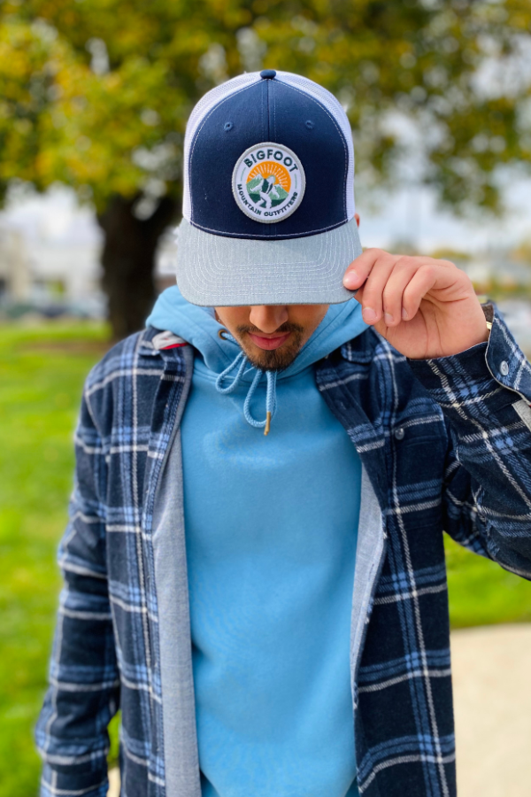 Bigfoot Mountain Outfitters original patch logo mesh back hat in Navy/Charcoal/White, a casual classic trucker hat for sunny days on the water, road trips, festivals and everyday wear