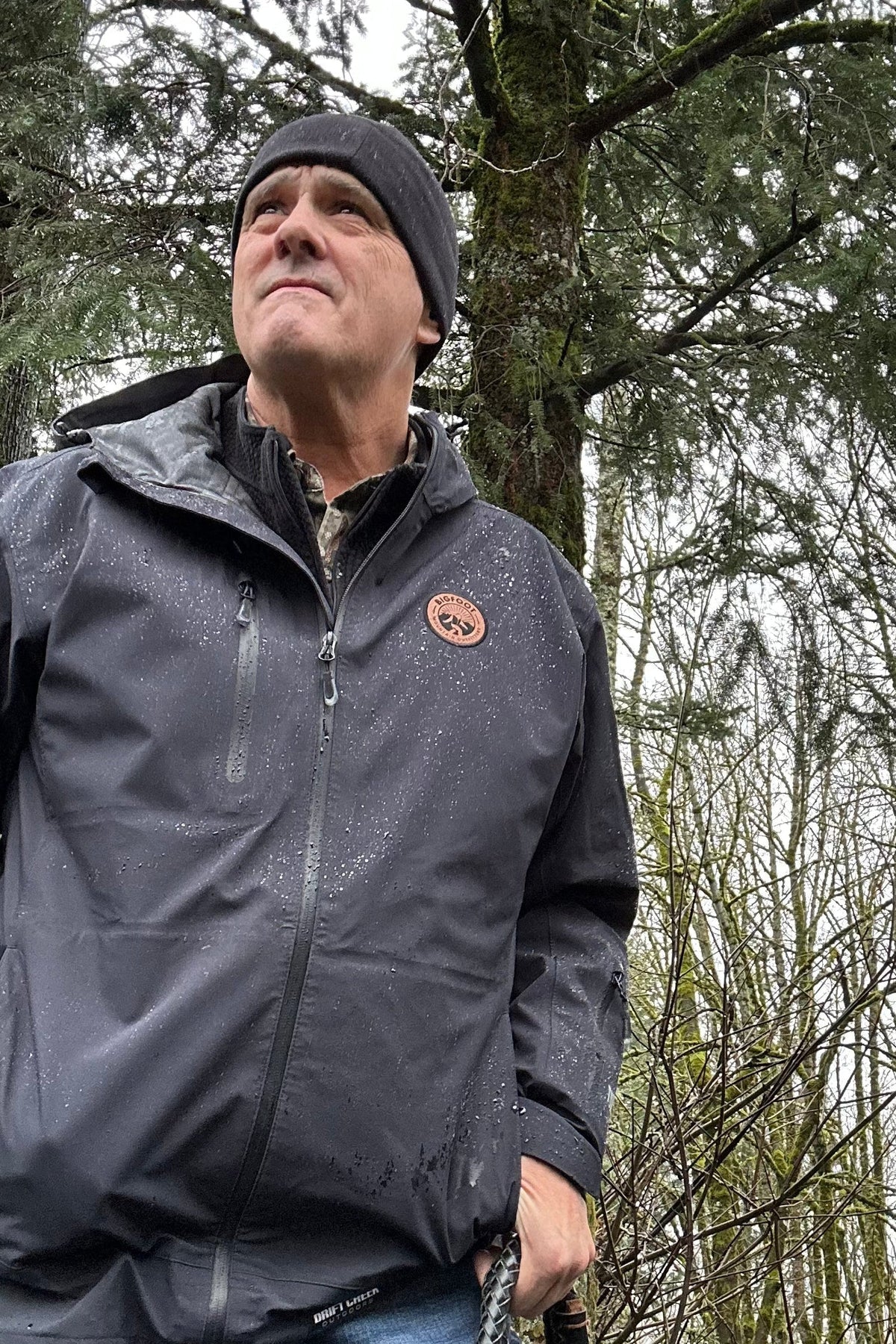 Bigfoot Mountain Outfitters BMO Ultimate Waterproof Rain Jacket in Black, a weather-ready layer built for rainy commutes, hikes, fishing trips and Pacific Northwest days