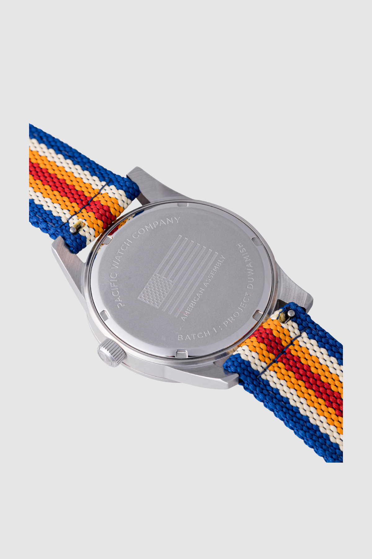 Pacific Watch Company Cascadia field watch in Slate Blue with PWC Stripe strap, a rugged USA-assembled 316L stainless steel watch for hiking, fishing, travel and everyday wear, a great gift for him
