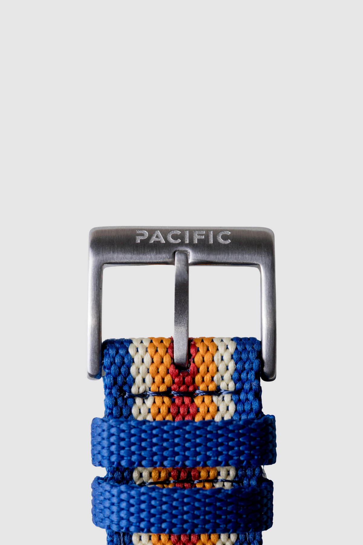 Pacific Watch Company Cascadia field watch in Slate Blue with PWC Stripe strap, a rugged USA-assembled 316L stainless steel watch for hiking, fishing, travel and everyday wear, a great gift for him