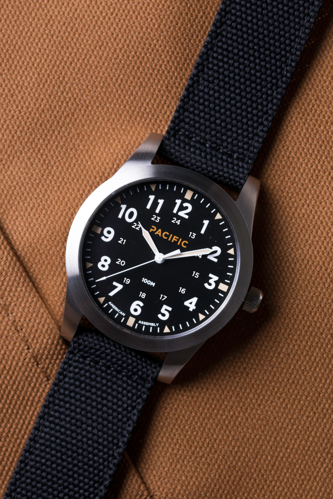 Pacific Watch Company Cascadia field watch in True Black with Black strap, a rugged USA-assembled 316L stainless steel watch for hiking, fishing, travel and everyday wear, a great gift for him