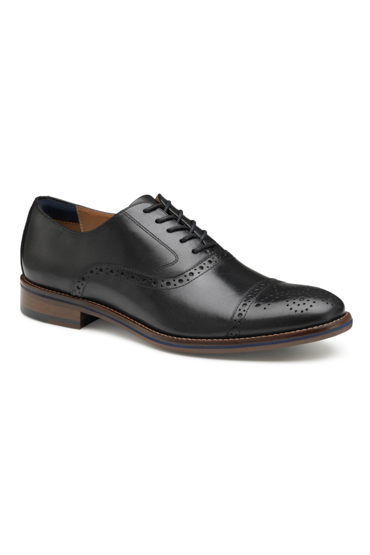 Johnston & Murphy Conard 2.0 cap toe in Black Full Grain leather, a classic, cushioned dress shoe that develops character with wear for the office, weddings and formal events