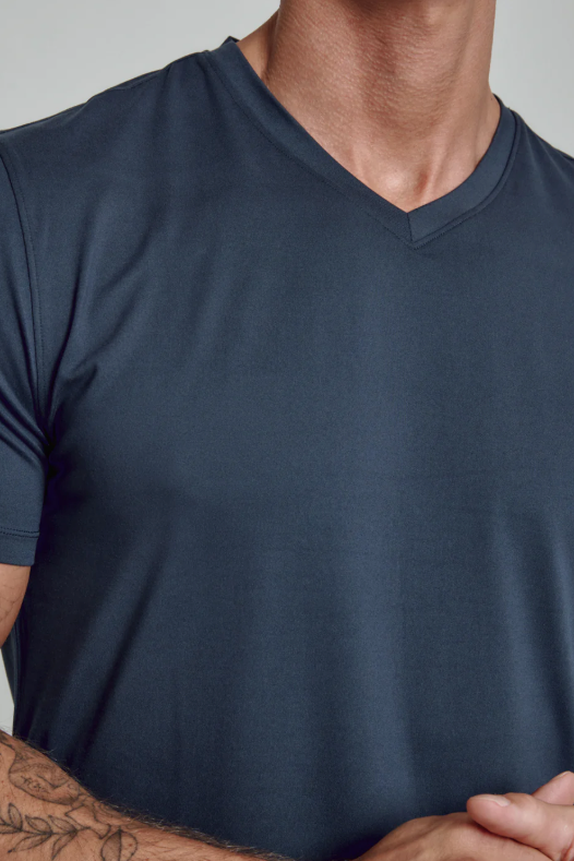 7 Diamonds Core V-neck tee in Island Blue, a soft, stretchy, sustainable everyday tee for layering under a jacket, travel days, the gym and weekends