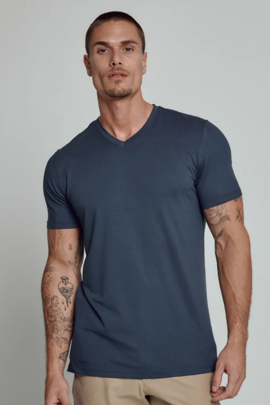 7 Diamonds Core V-neck tee in Island Blue, a soft, stretchy, sustainable everyday tee for layering under a jacket, travel days, the gym and weekends