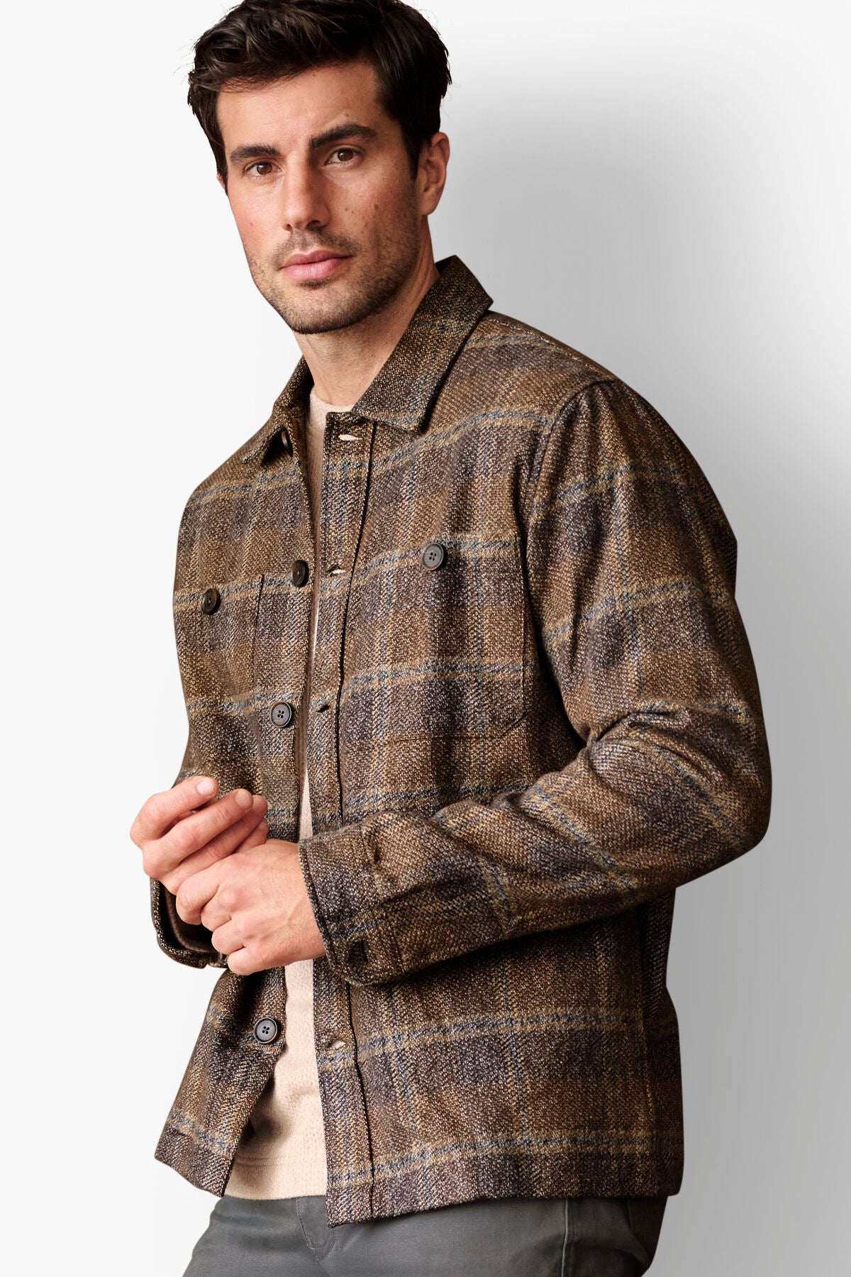Johnston & Murphy Marled Plaid Shirt Jacket in Brown/Navy worn open over a tee, a heavyweight marled plaid shacket with two button chest pockets