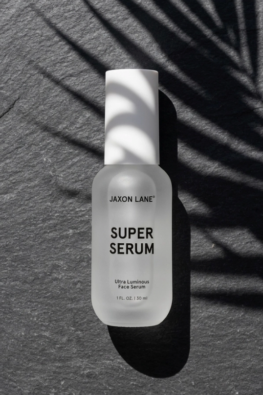 Jaxon Lane Super Serum Ultra Luminous Face Serum, a men's grooming essential for a fresh daily routine, travel bags and thoughtful gifting