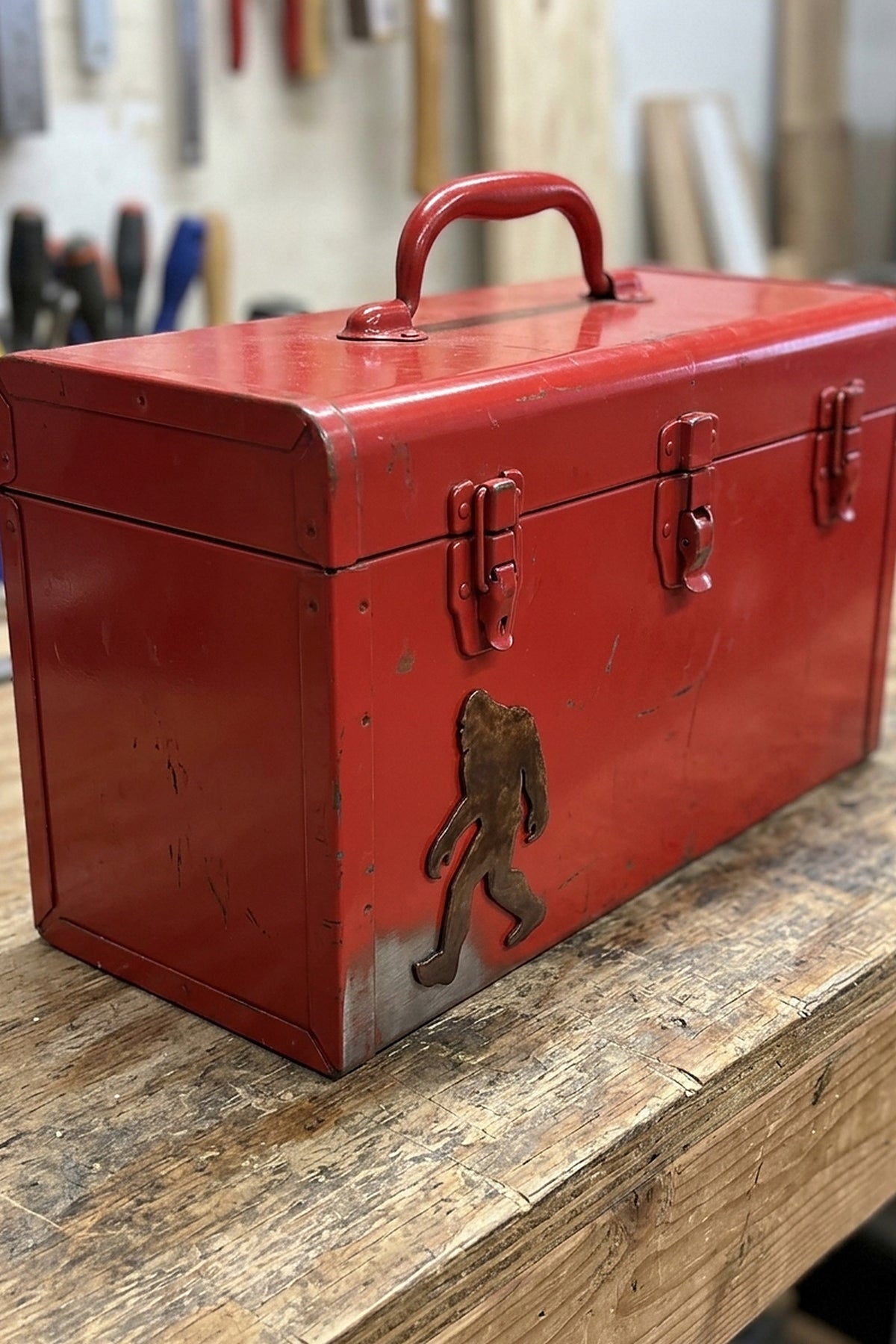 Paradise Cay Publications Walking Bigfoot large magnet on a red toolbox, a big rusted steel Bigfoot magnet for the toolbox, truck, fridge or filing cabinet, and a fun gift for Bigfoot believers