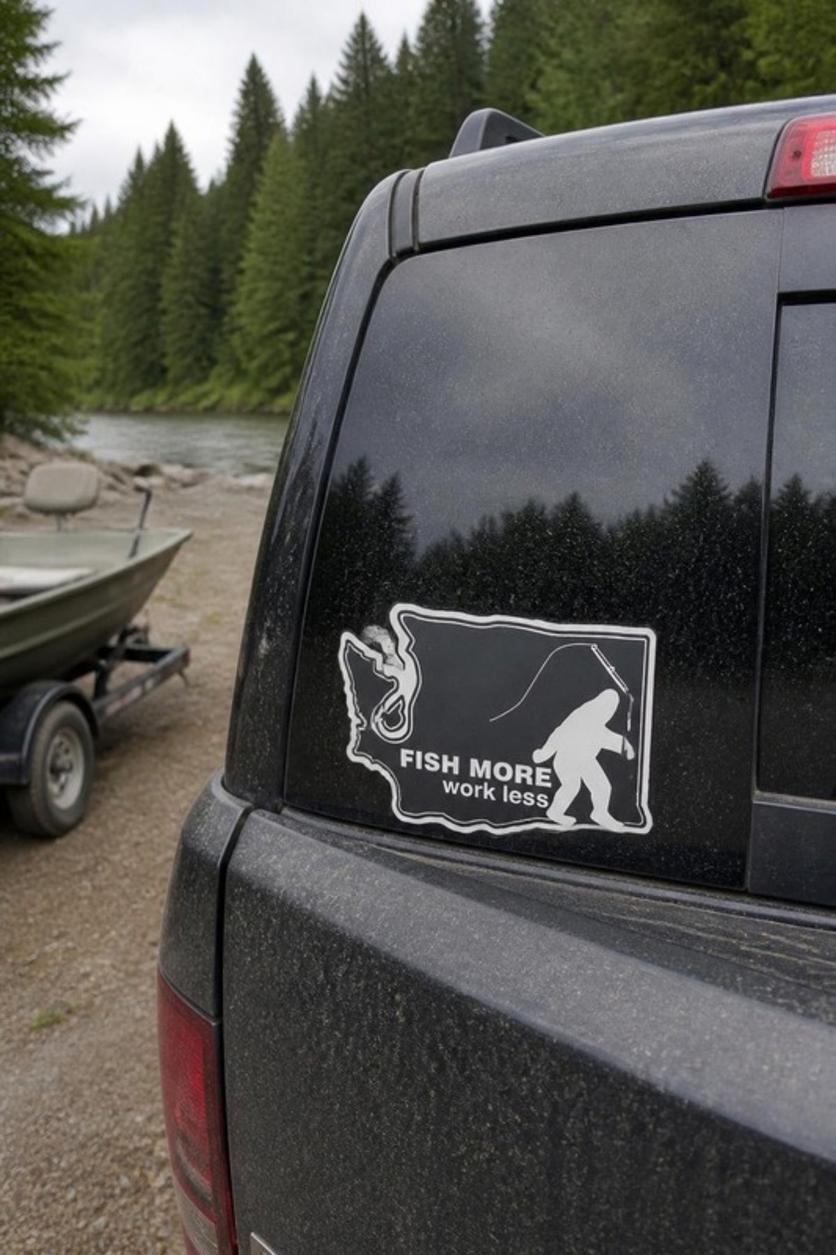 Bigfoot Mountain Outfitters Washington Fish More Work Less Sticker on a truck window at the boat launch, a Washington state Bigfoot fishing decal for trucks, coolers and drift boats