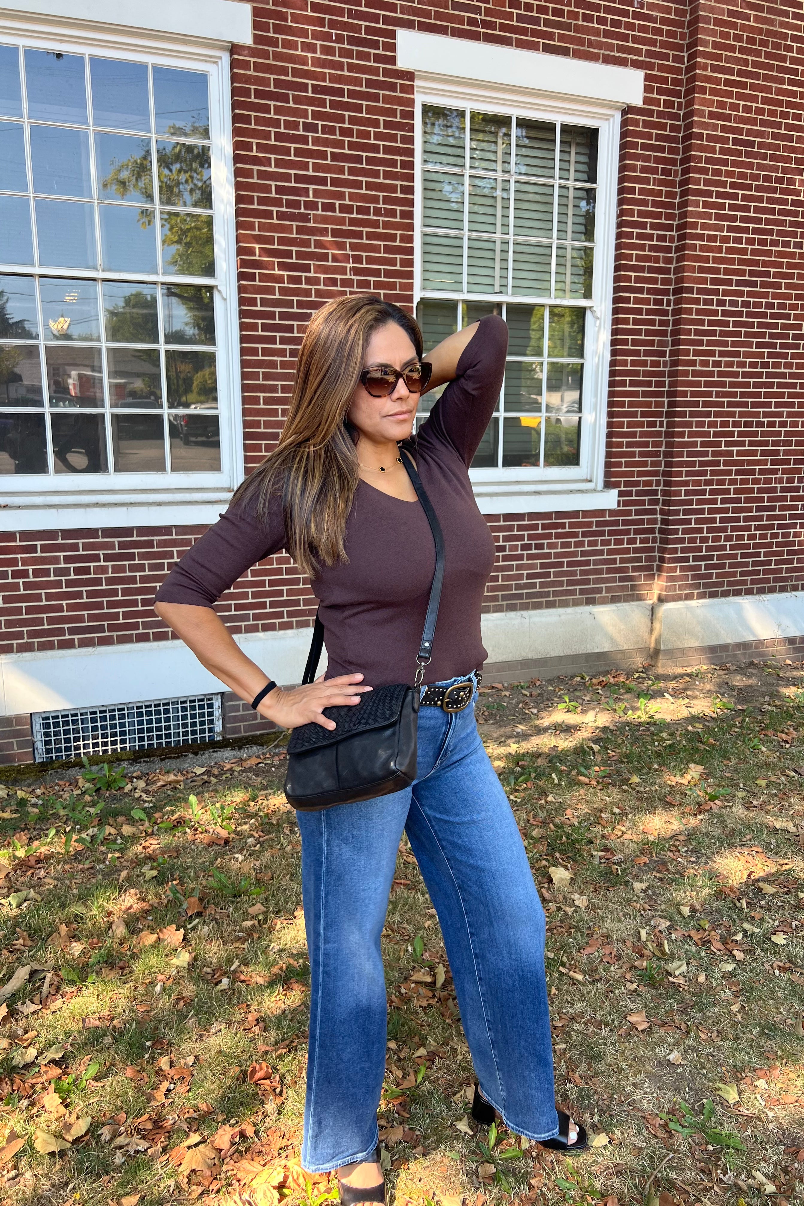 Crafted in our iconic shine fabric, the subtle sheen makes this top a chic day-to-night style. It features a delicate v-neckline and ¾ sleeves. The front is double-layered for a more weighty feel. Wear yours with a midi skirt or pants.