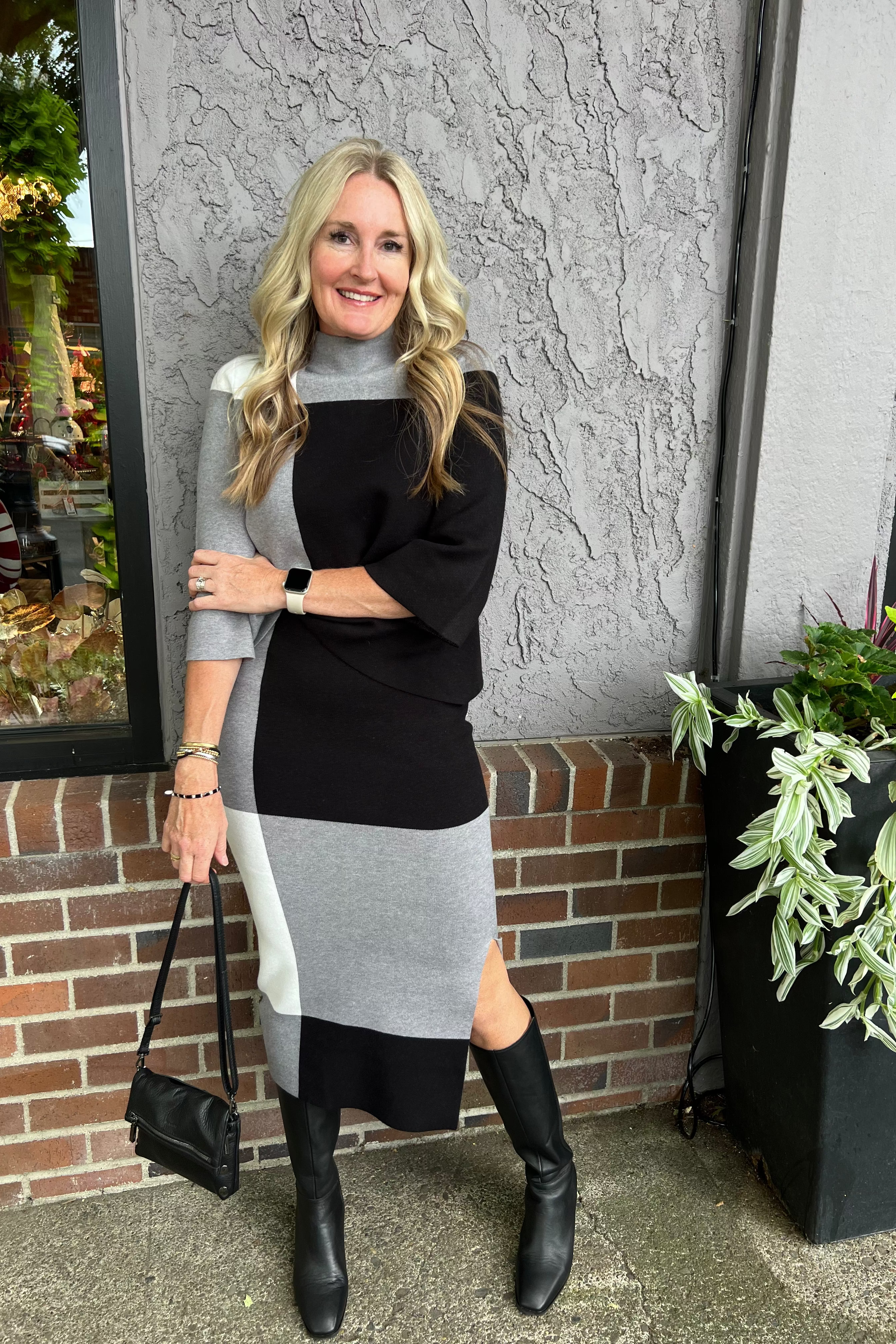 This&nbsp;Joseph Ribkoff jacquard sweater skirt&nbsp;combines cozy comfort with contemporary style through its modern color-block design. Made from warm jacquard knit, it features an elastic waistband for a comfortable, easy pull-on fit. The flattering mid-calf length makes it perfect for cooler days, whether you're enjoying a casual coffee meet-up or a professional office setting. Its versatile design ensures both warmth and sophistication in one elegant piece.