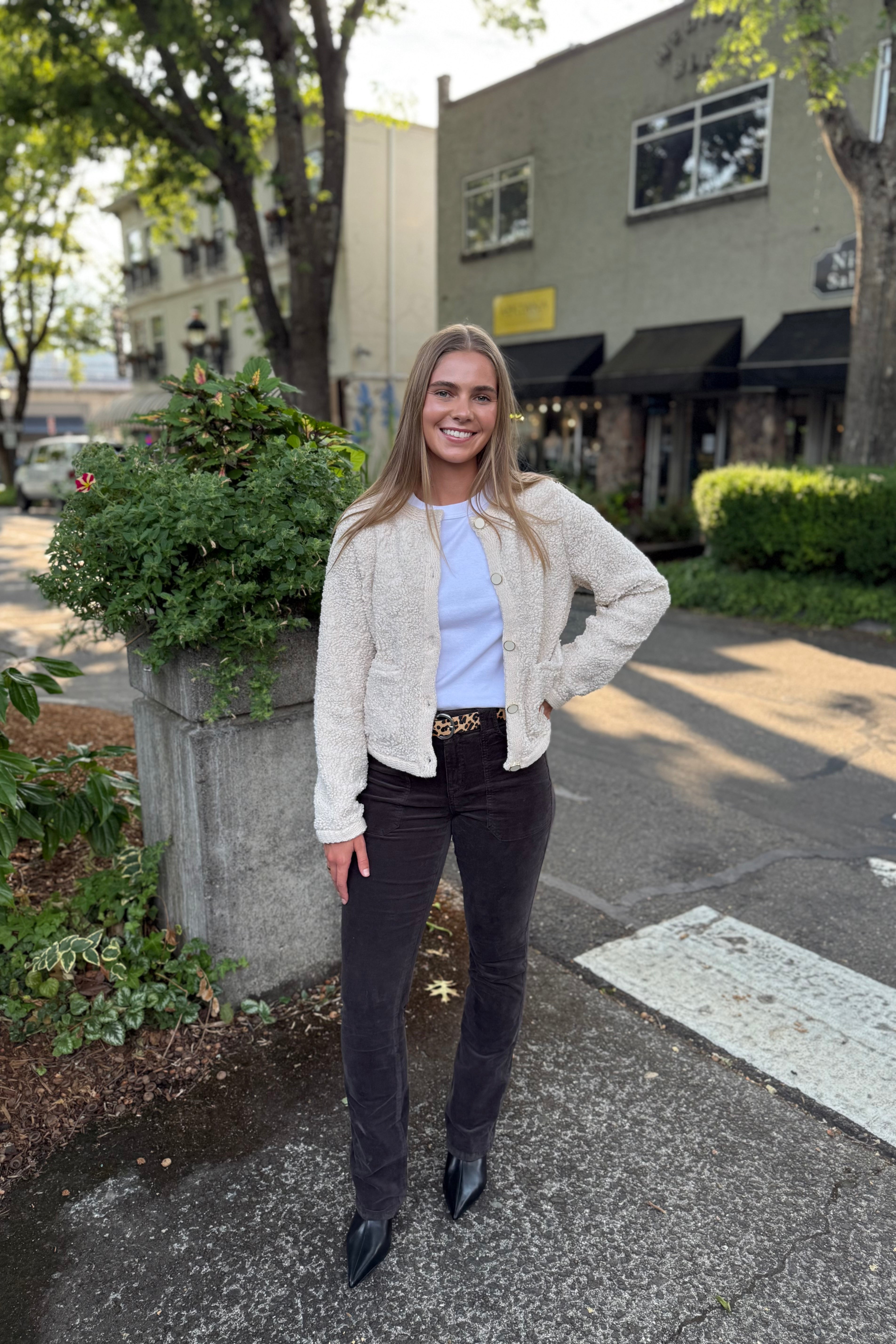 Experience day-long comfort with the Cuddle Up Cardi, crafted from nubby-textured fleece made entirely of recycled polyester. Its soft, cozy fabric offers gentle warmth while supporting sustainability. Perfect for layering or lounging, this cardigan brings both comfort and conscious design to your wardrobe.