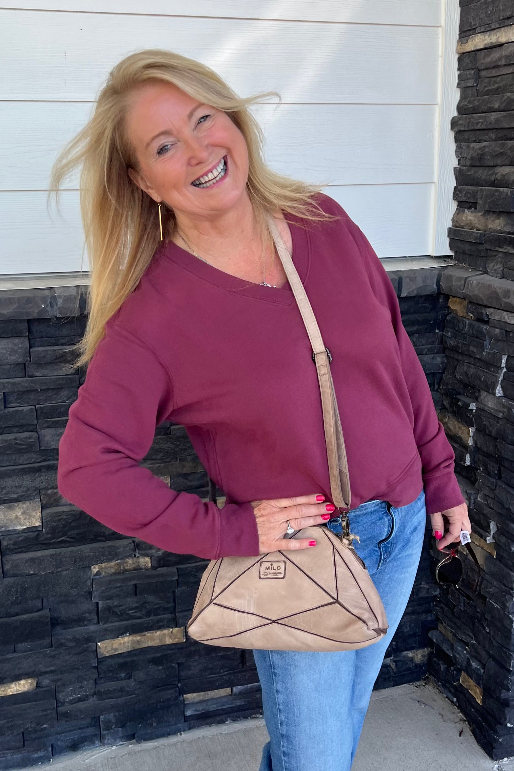 Experience unparalleled comfort with our Deep V-Neck crafted from 100% cotton French terry. This long-sleeved piece offers a luxuriously soft feel and a flattering deep V neckline, making it an essential addition to your wardrobe for both style and ease.