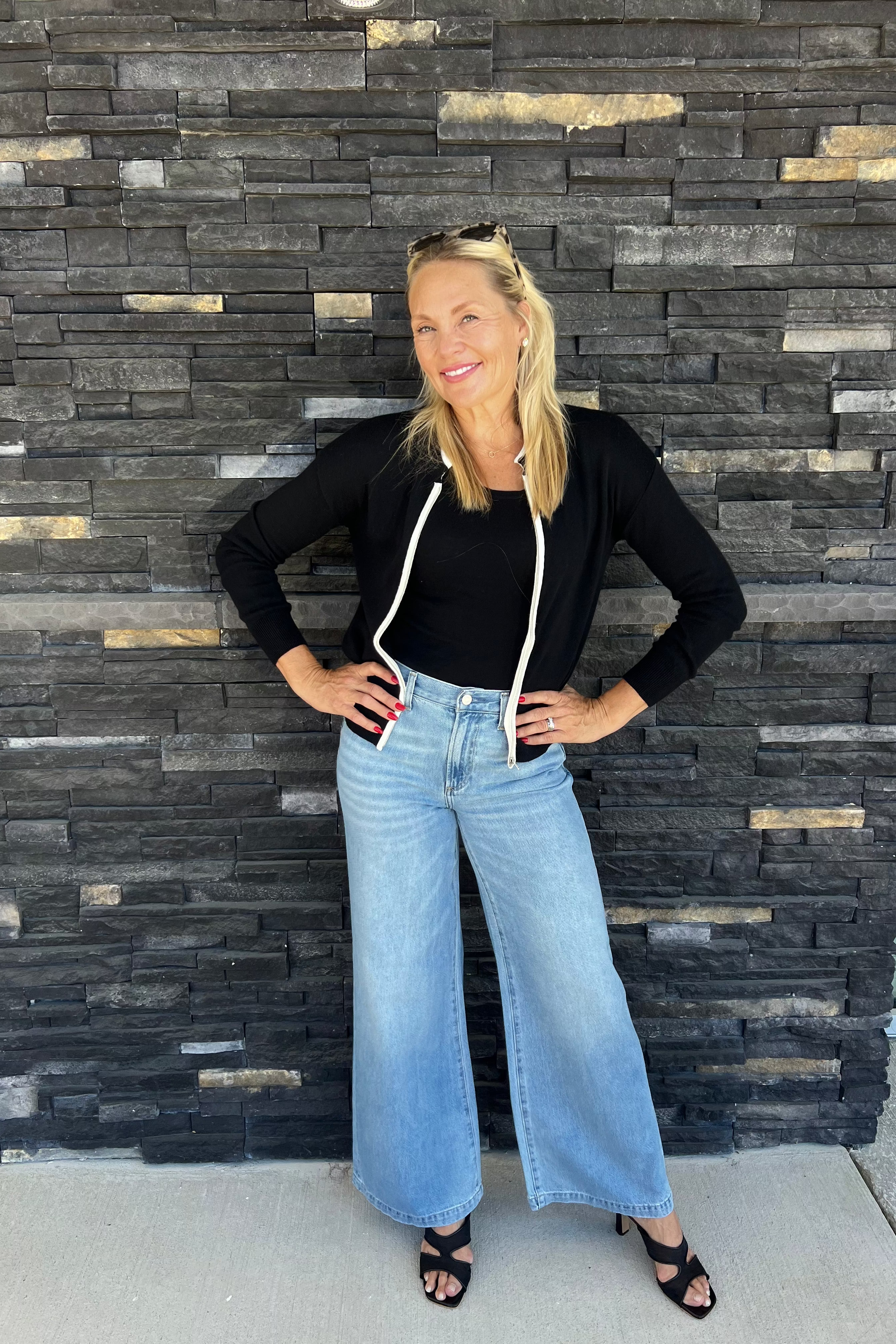 Black and white double collar zip cardigan.&nbsp; Looks like a layered set, but is one piece, and looks amazing paired with denim or your favorite skirt.&nbsp;