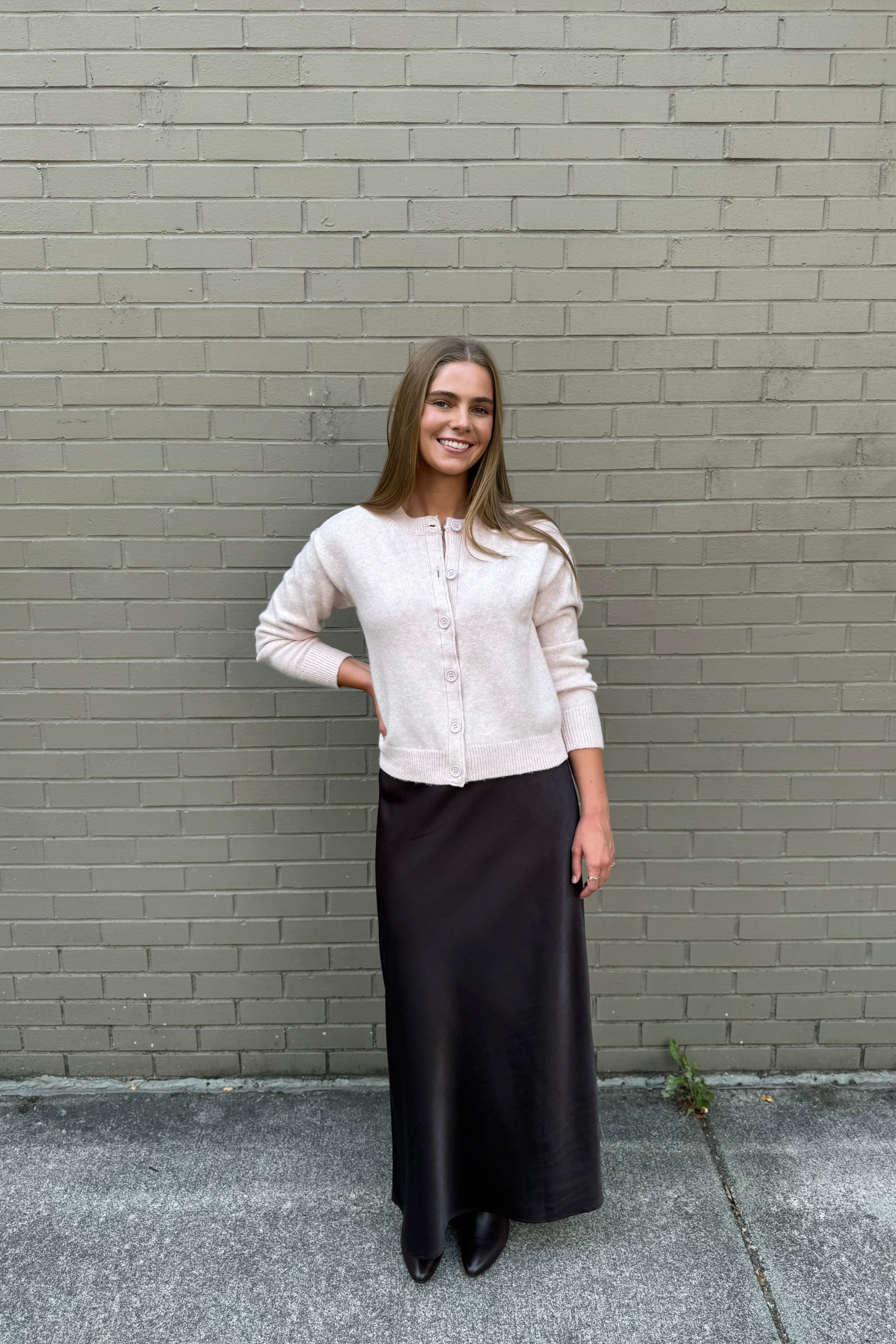 This versatile maxi skirt features a standard rise and A-line shape for a comfortable and flattering fit. The elastic waistband allows for easy movement and the relaxed fit offers a casual yet stylish look. Perfect for everyday wear, this skirt is a must-have addition to your wardrobe.