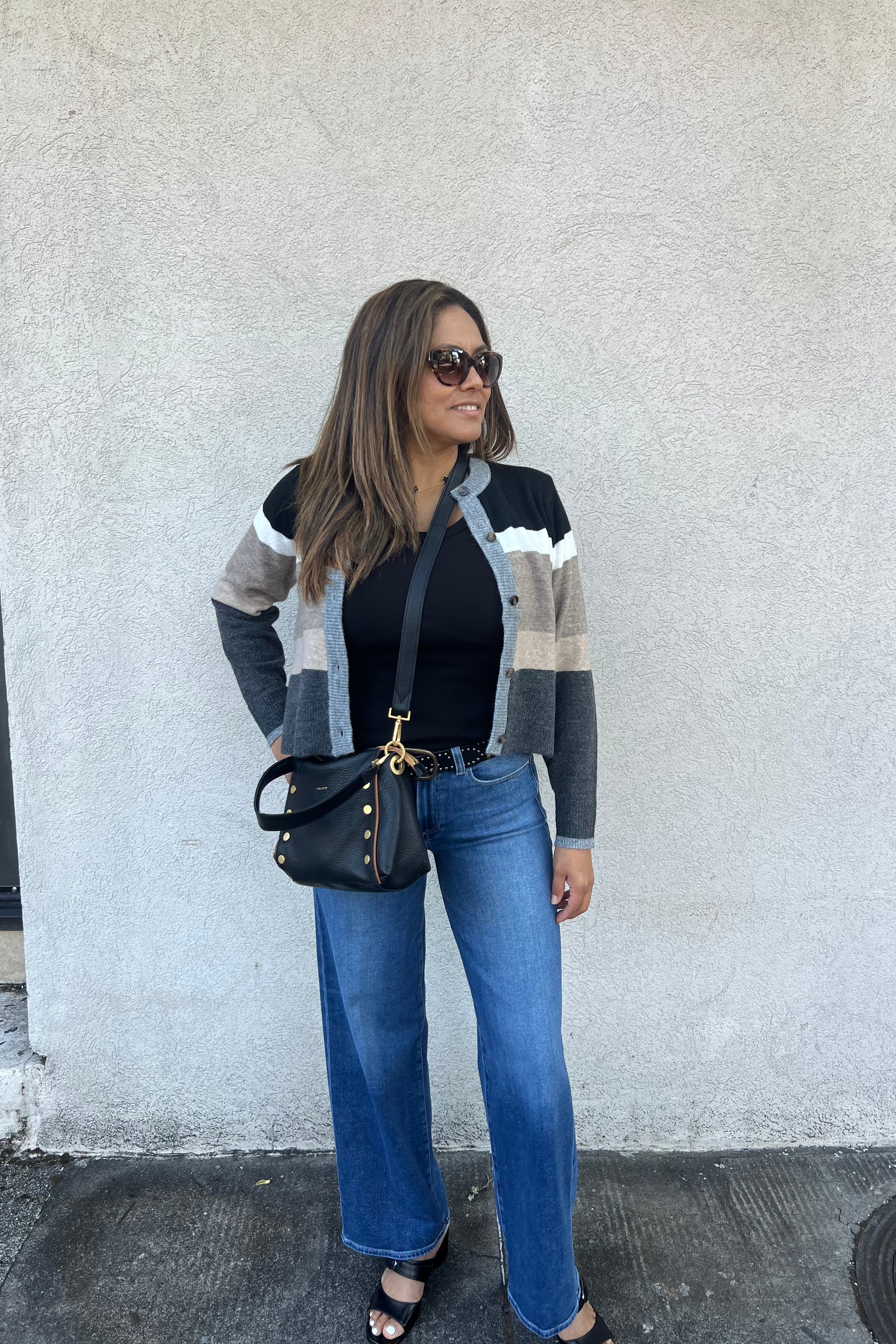 The Fiona Cardigan blends structured elegance with cozy comfort in a luxe cotton blend. Crafted from it offers a semi-fitted shape that flatters naturally. Thoughtful details like fabric-covered buttons and ribbed trim elevate its timeless design. This cardigan is soft to the touch and perfect for layering.