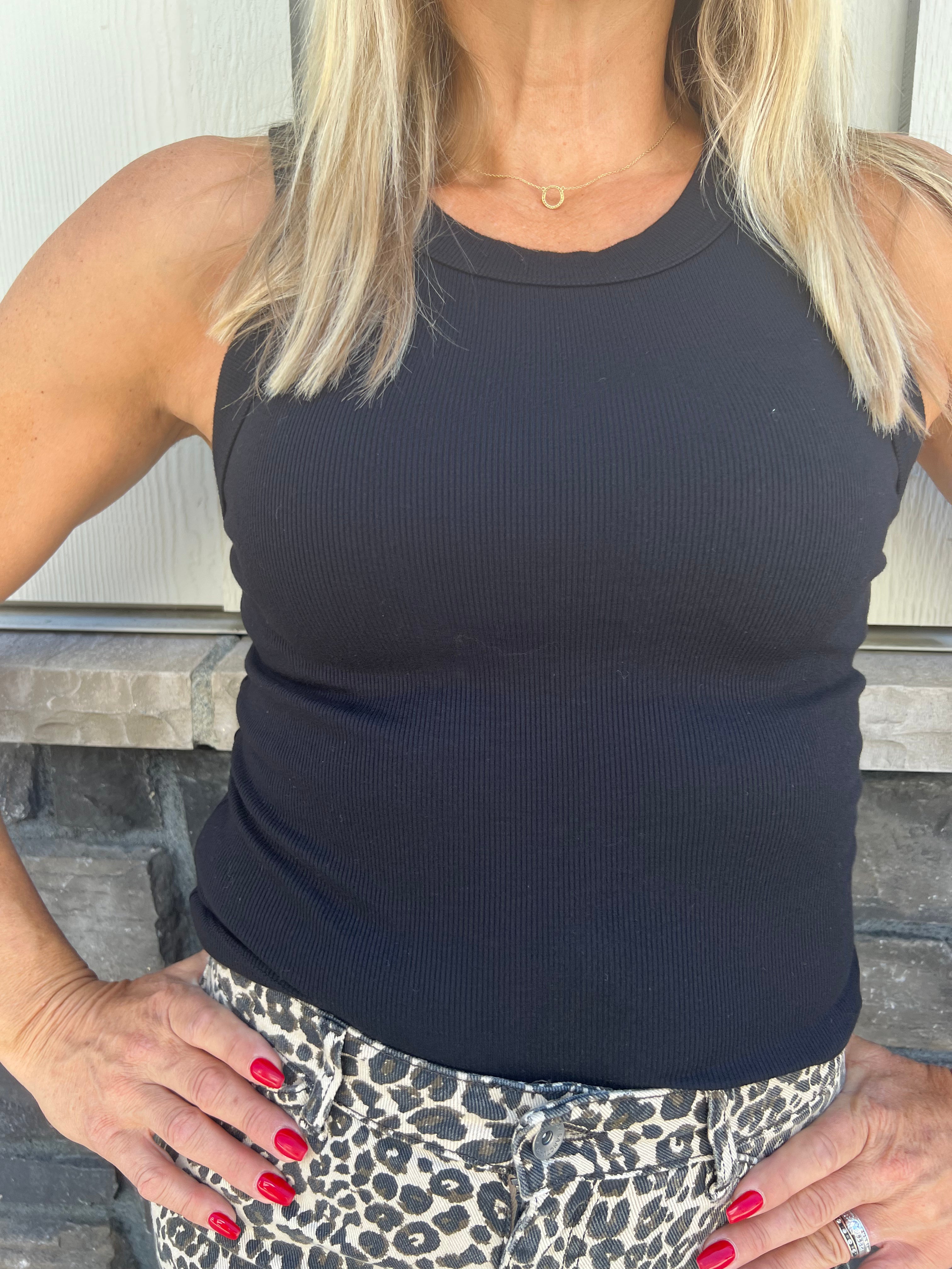 Gina is a wardrobe staple, with a ribbed, cropped fit, wide binding and a high neck. Made from our soft Ultra Rib fabric that washes well and keeps its shape throughout wearing.
