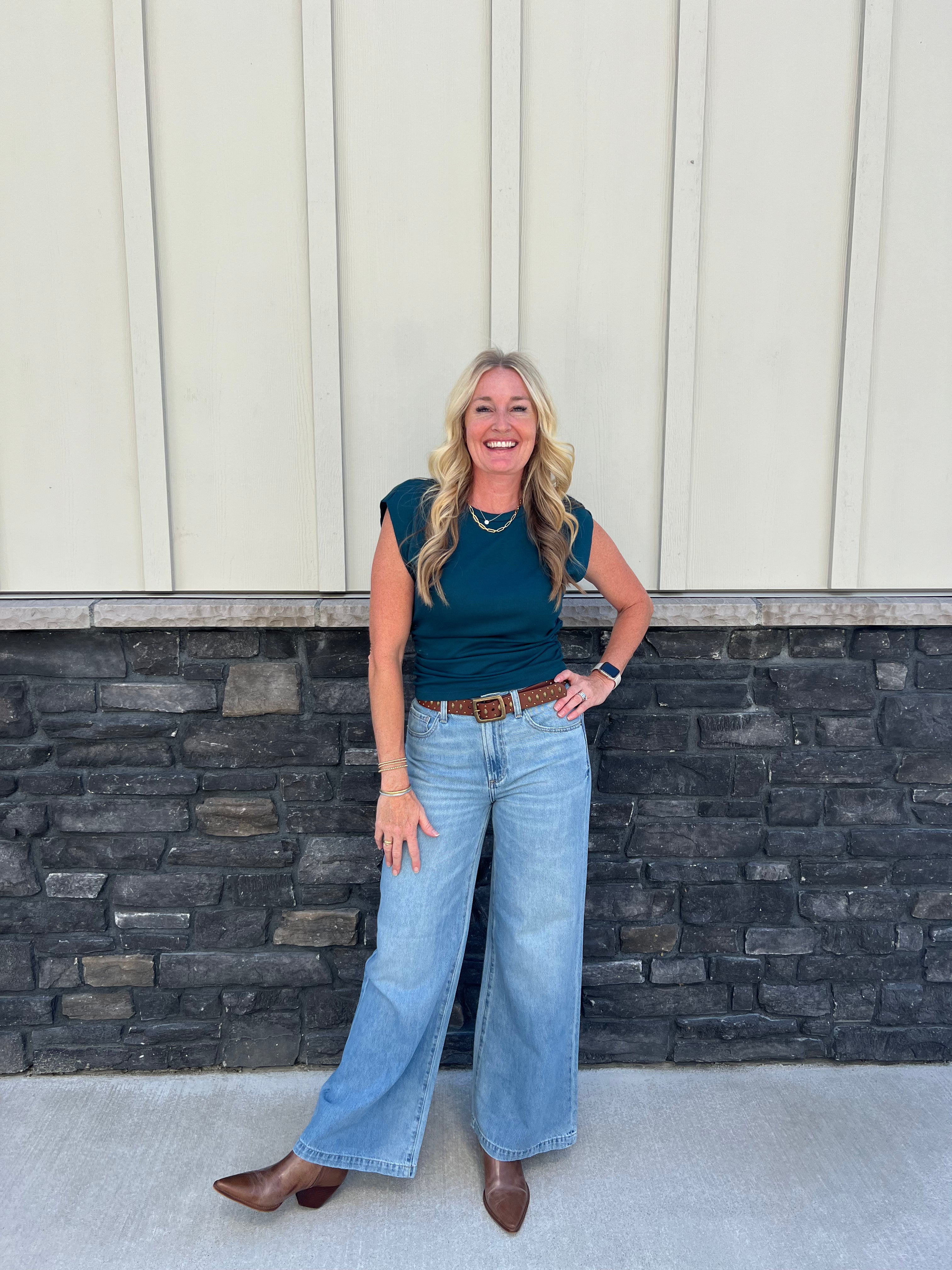 The Joni Top is similar to our popular Amara tee, but with a crew neck and a powerful shoulder design. It also has a slight crop and ruching on the sides. Crafted from our Ultra Rib fabric, it is highly durable and can be washed and treasured for many years.