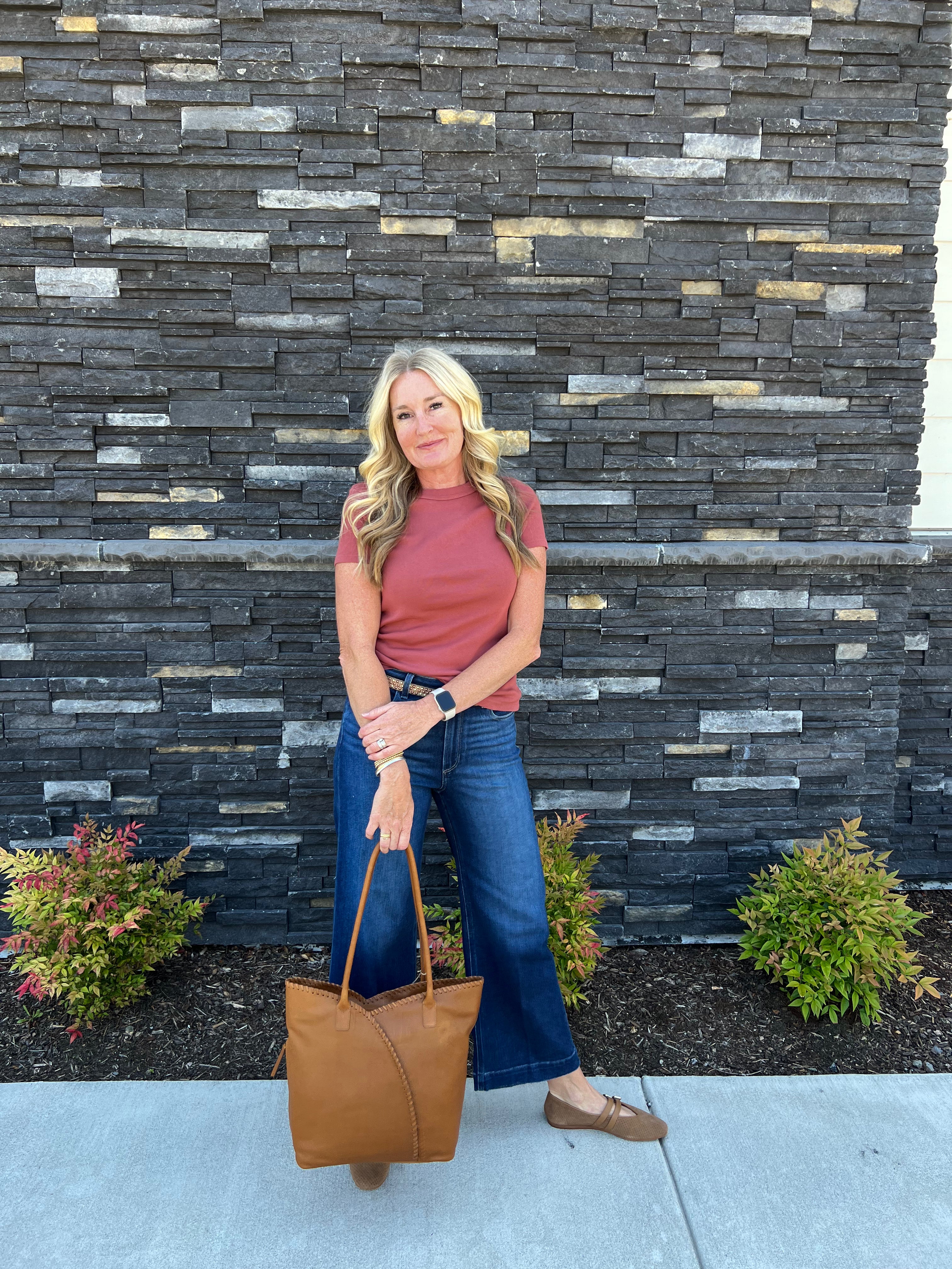 The Lexy tee is the definition of classic. This tee has a body skimming fit, features a capped short sleeve that hits just right and a crewneck with wide binding. Made from our bestselling 1x1 Cotton fabric that is a heavier weight cotton rib that washes well and keeps it shape.