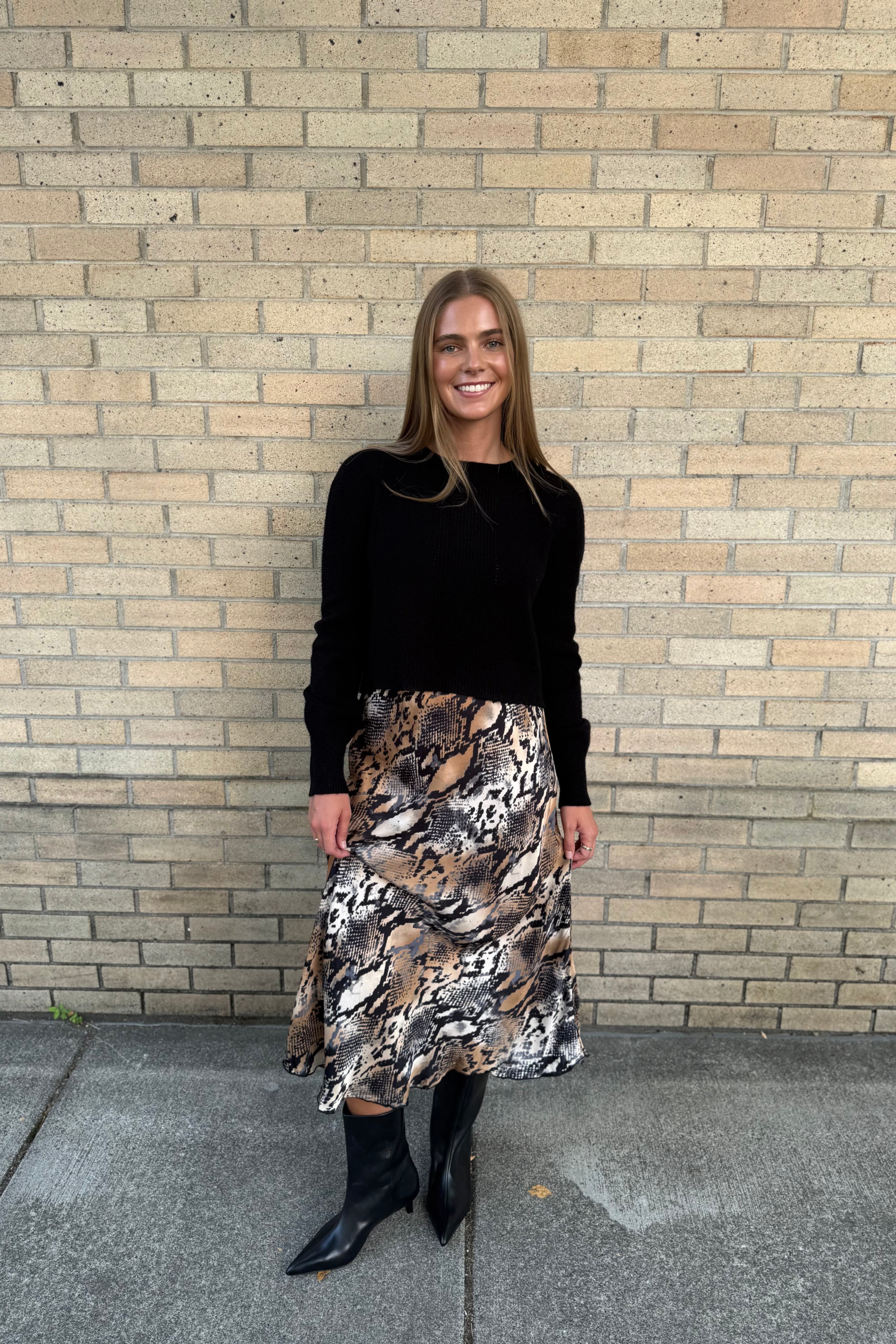 Expertly crafted for the fall season, this crop sweater is ultra soft and pairs perfectly with a matching skirt or any denim. Its rich color is perfect for the autumn months, making it a must-have addition to your wardrobe this fall.