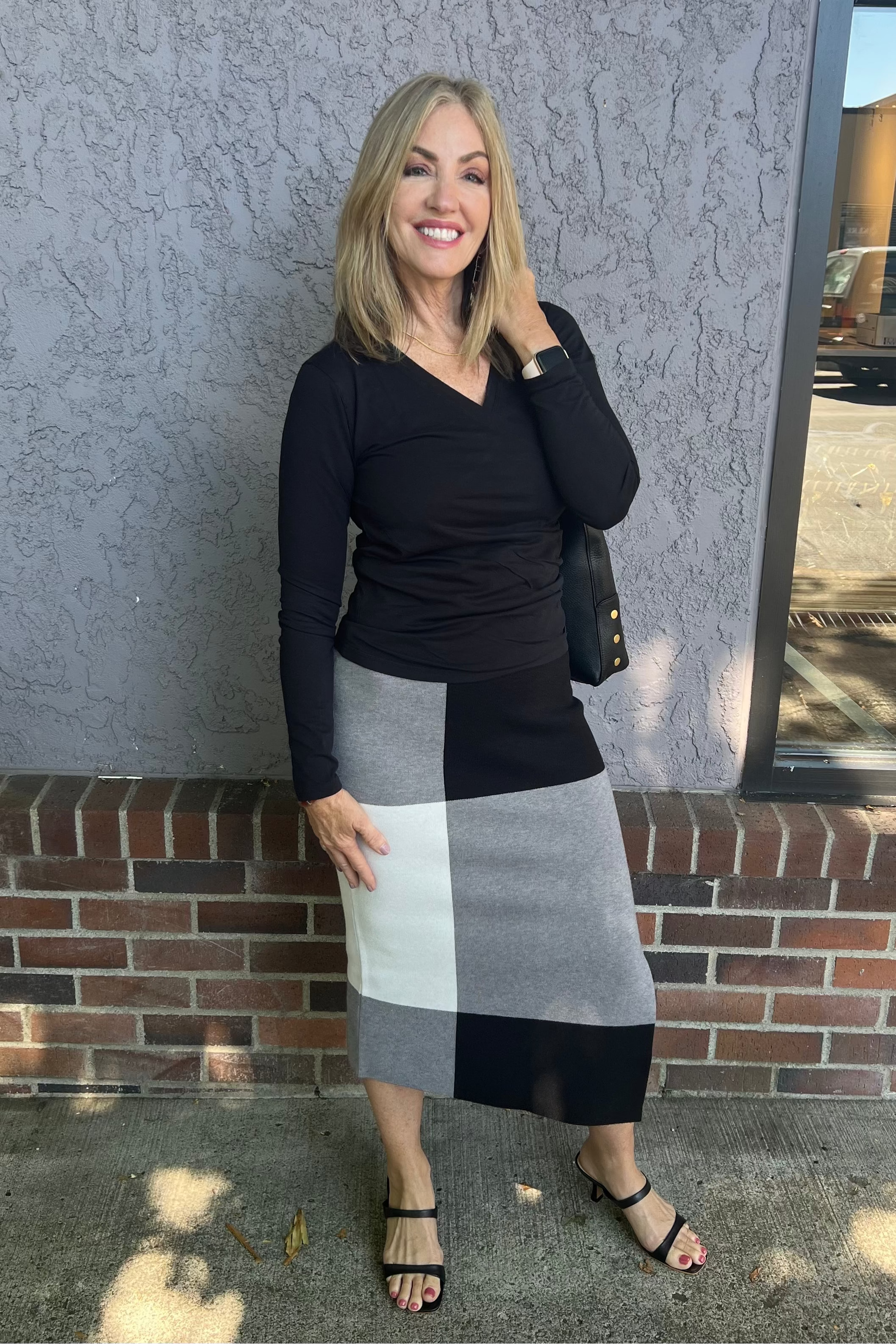 This long sleeve surplice top by Pure Amici serves as an essential wardrobe staple with a stylish twist. Versatile enough to complement both denim and tailored trousers, it effortlessly elevates your everyday look.