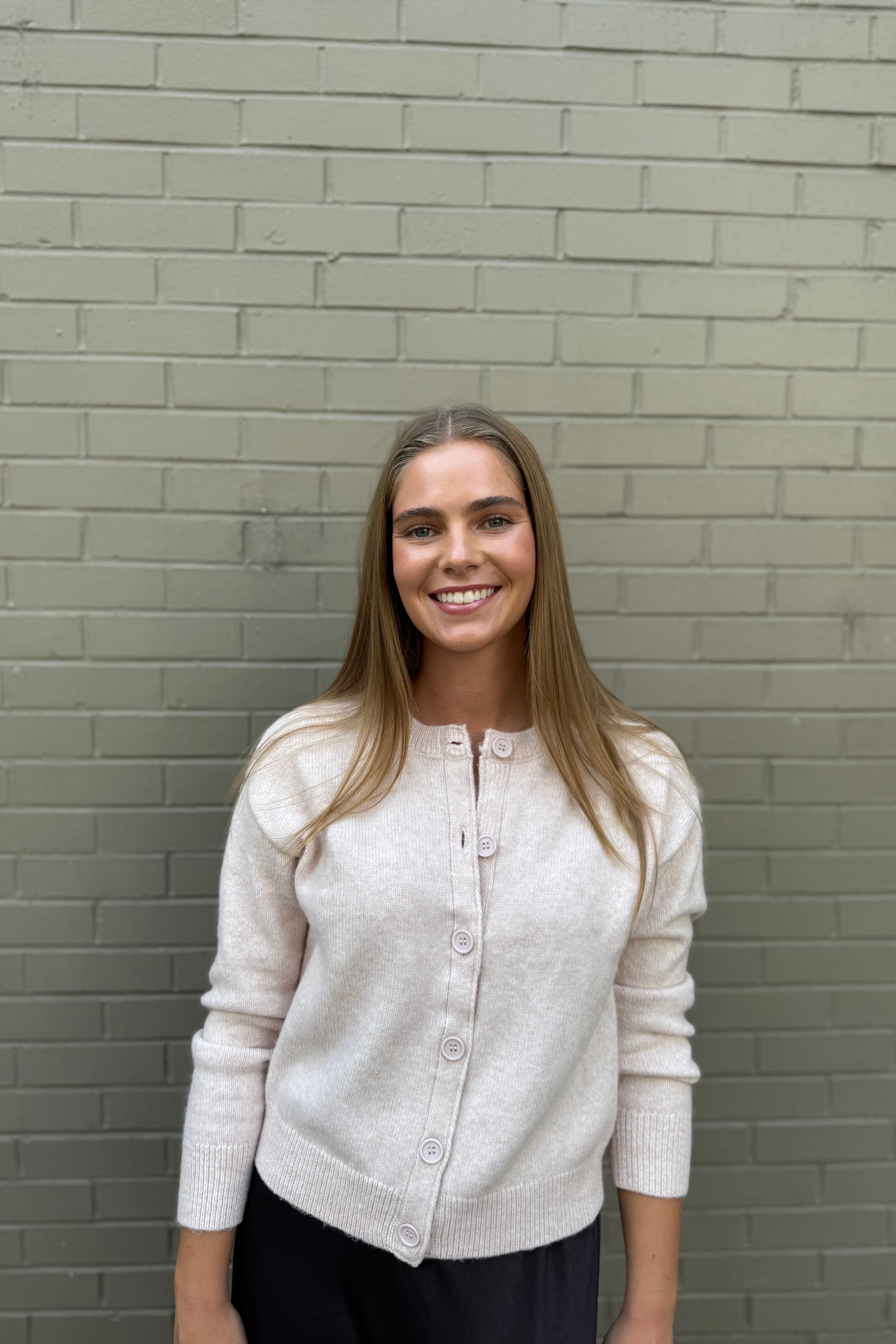 The Must Have Cardi features a relaxed fit with a button-front closure and ribbed cuffs for a polished look. Its recycled polyester content supports environmental responsibility by utilizing recycled petroleum sources. Perfect for layering, it offers both style and sustainability.