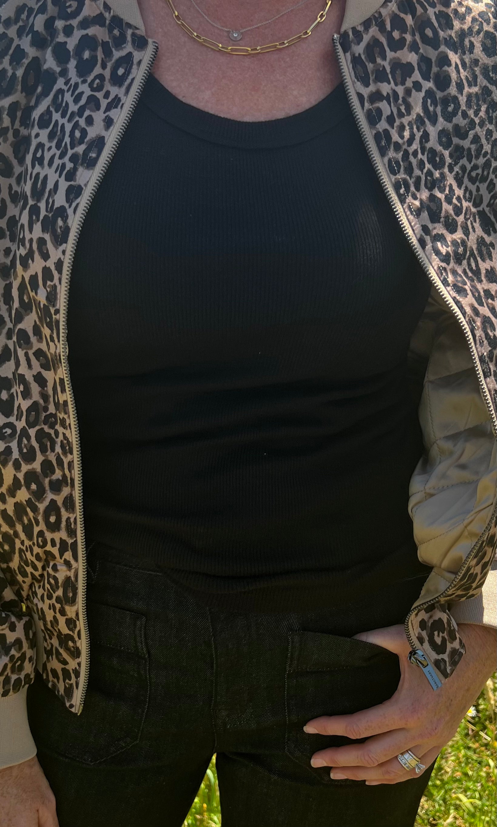 Bringing something special to your everyday tank. Crafted in our timeless, signature Shine fabric, this tank features a body sculpting fit with a scoop neckline. Dress this favorite up or down with denim, a satin skirt or your favorite lounge pants.