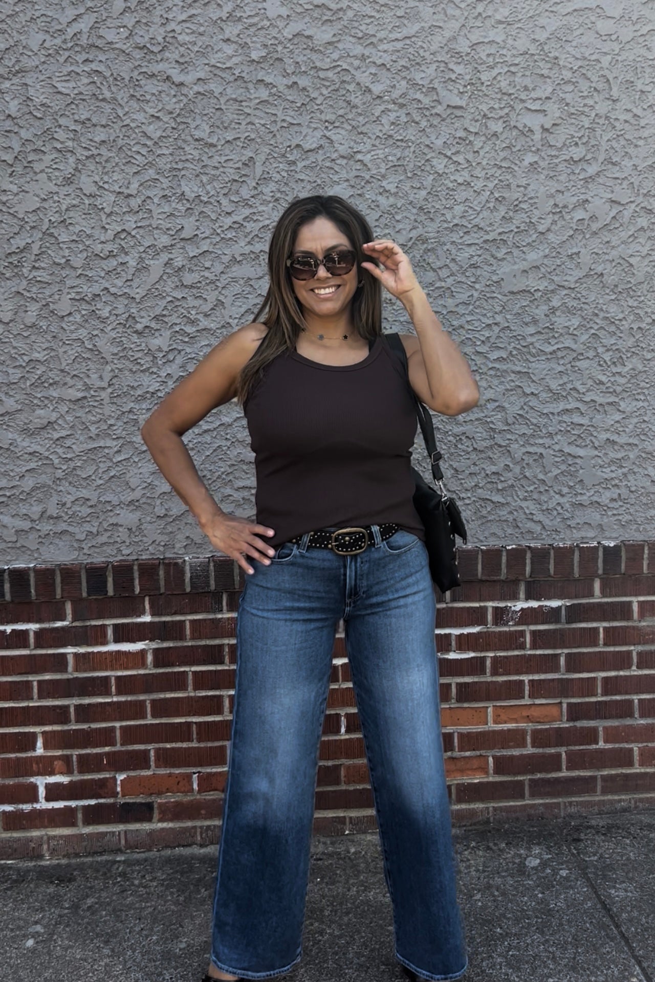 Bringing something special to your everyday tank. Crafted in our timeless, signature Shine fabric, this fitted tank features a body sculpting fit with a scoop neckline. Dress this favorite up or down with denim, a satin skirt or your favorite lounge pants.