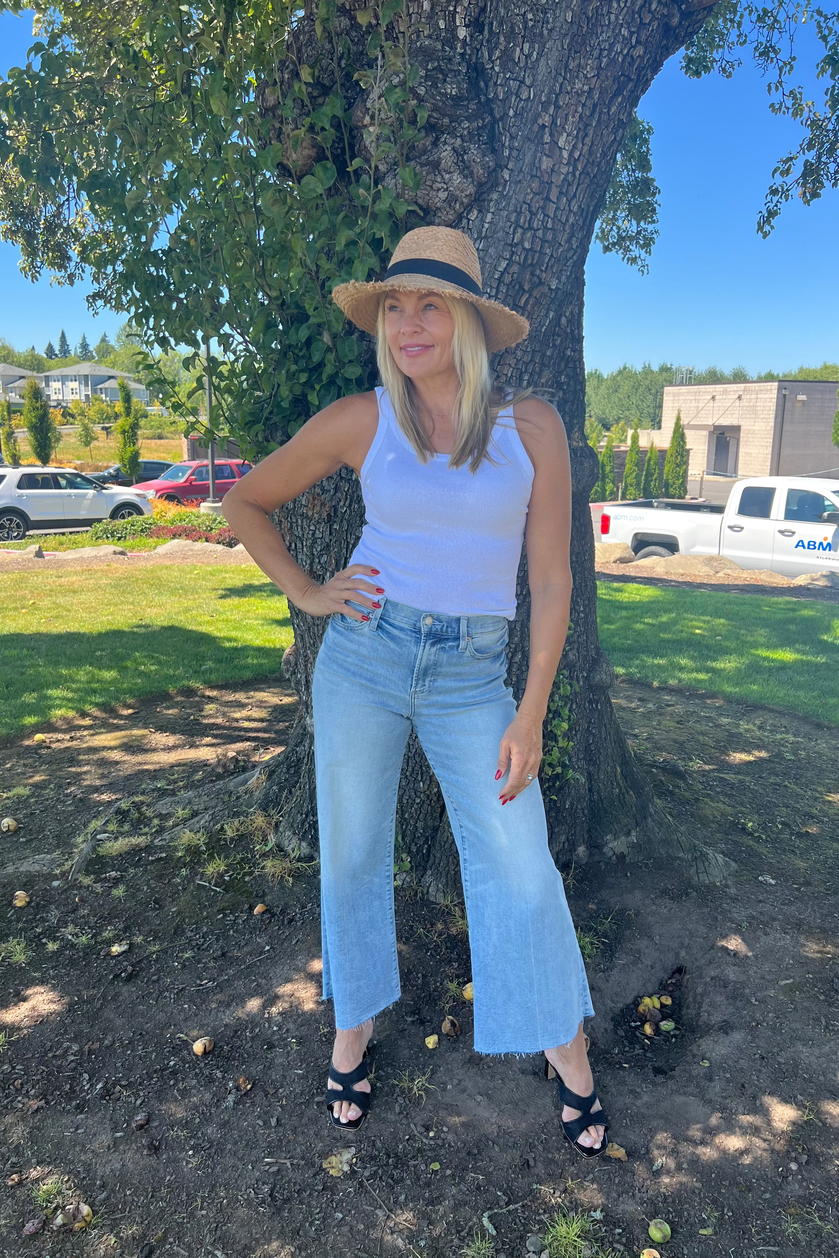 Bringing something special to your everyday tank. Crafted in our timeless, signature Shine fabric, this tank features a body sculpting fit with a scoop neckline. Dress this favorite up or down with denim, a satin skirt or your favorite lounge pants.