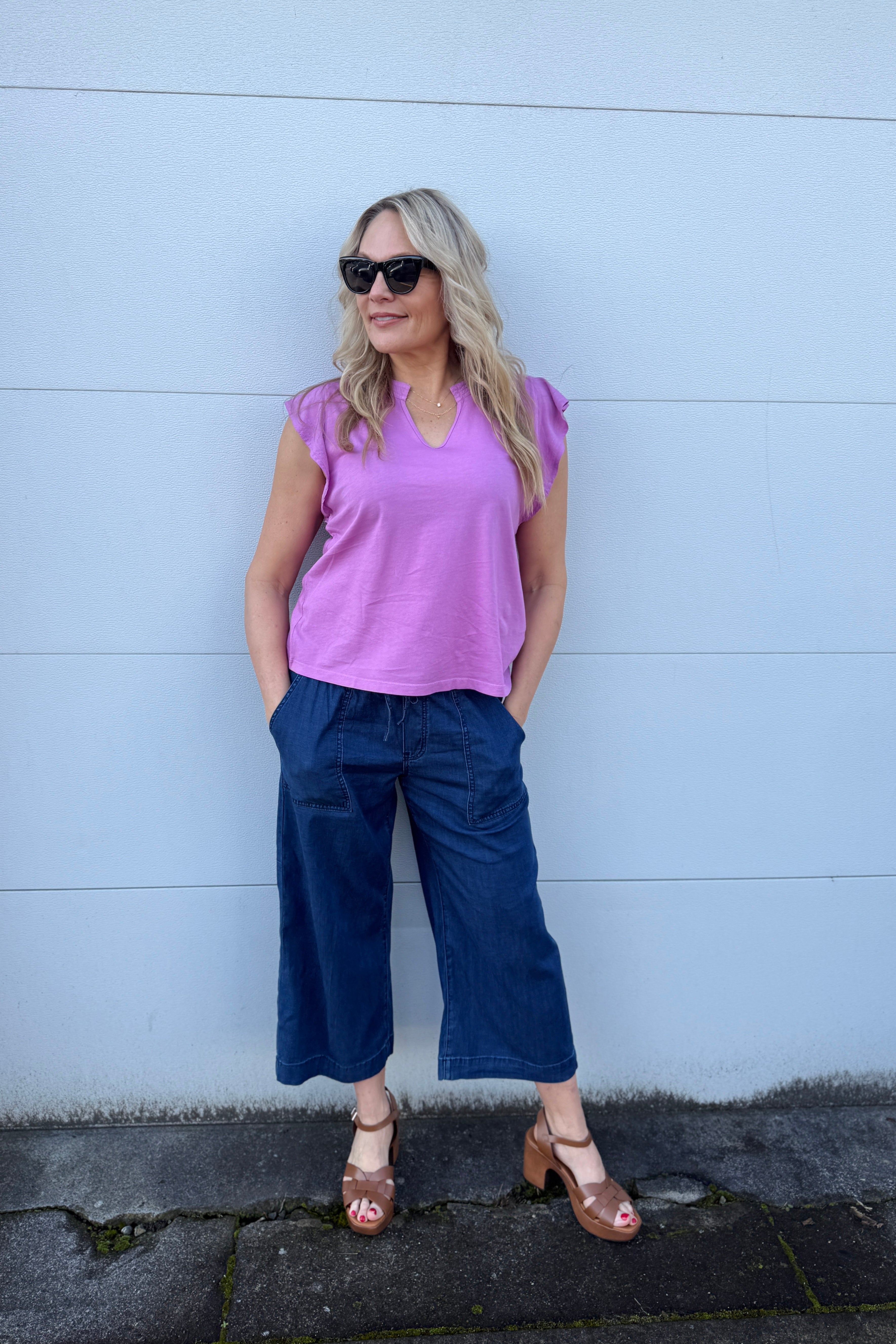 Here at Arktana we are loving the shades of pink this summer. What a fun top for almost any occasion, so easy to dress up or down.