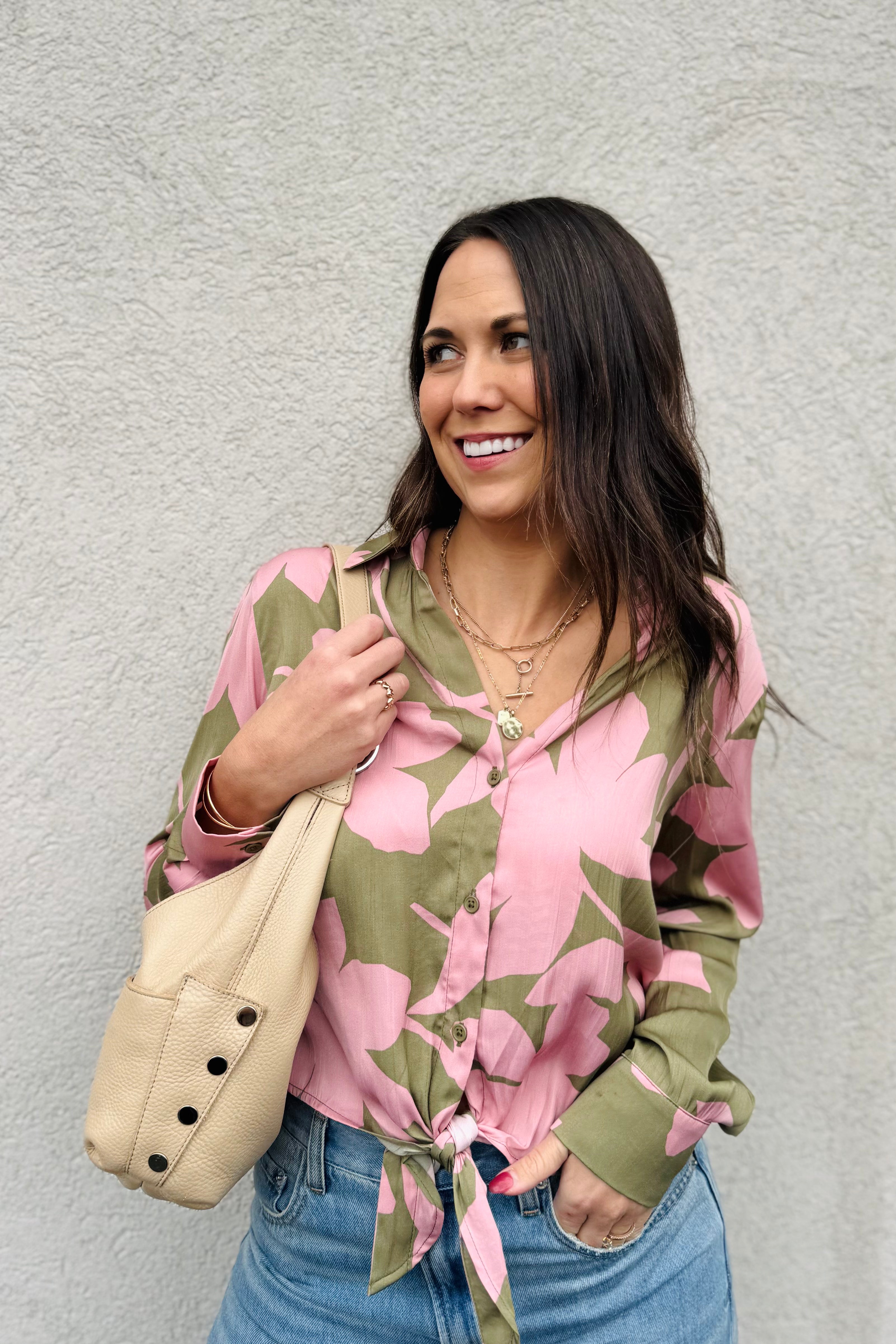 This is the perfect blouse for a date night, Holiday or Vacations! Love this green and Pink Combo with w button down front and tie! So many outfit options