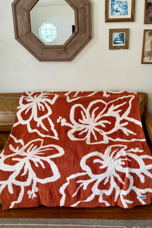 Sundream Hibiscus Plush throw blanket in Rusted Red
