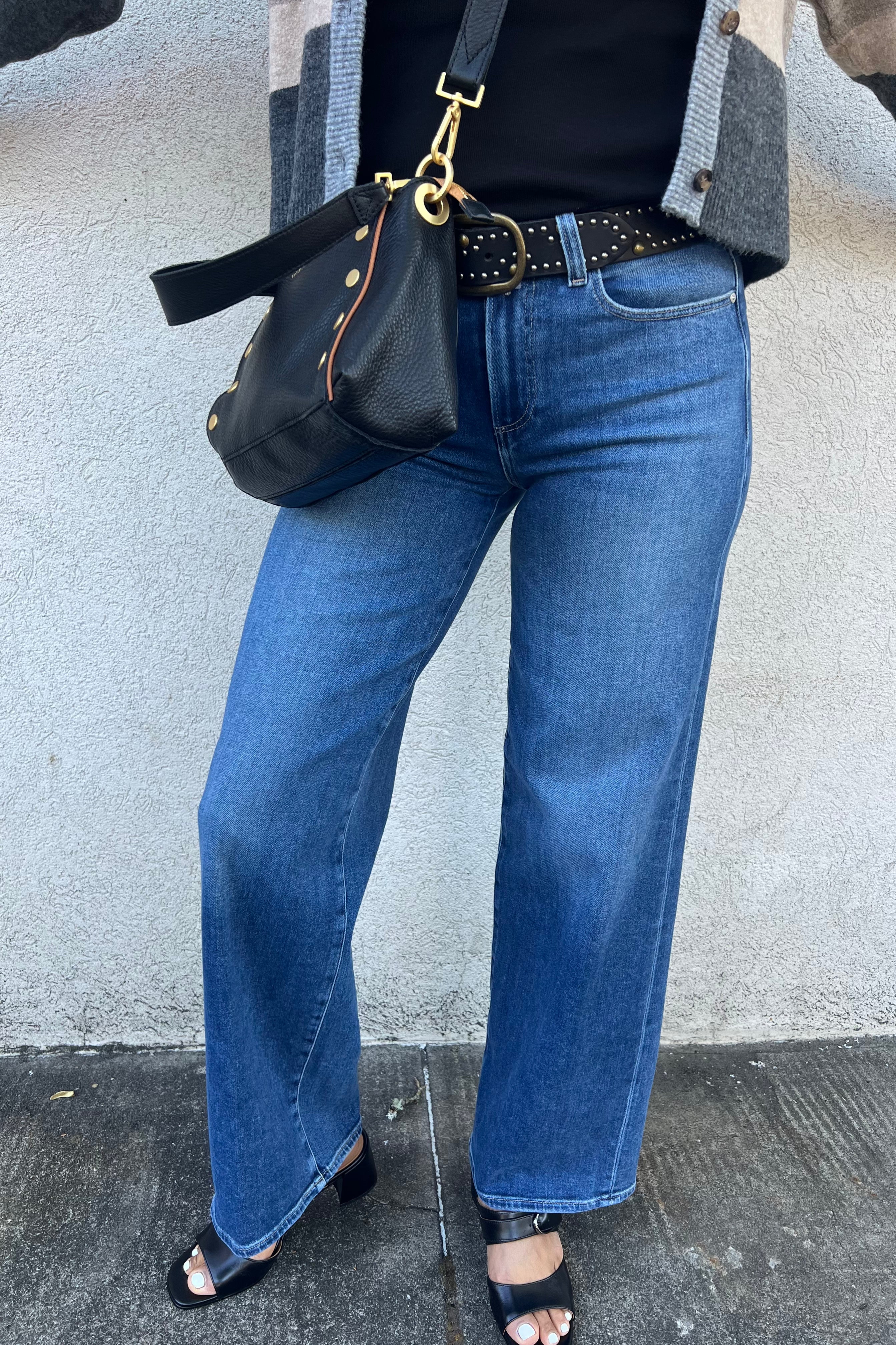 Tatum 32" offers a refined update to our classic Sasha silhouette, combining a fitted top with a subtly relaxed cut and a mid-rise waist for comfortable, stylish wear. Crafted from TRANSCEND VINTAGE denim in a medium wash with natural fading, it captures authentic vintage appeal while providing exceptional stretch and recovery.