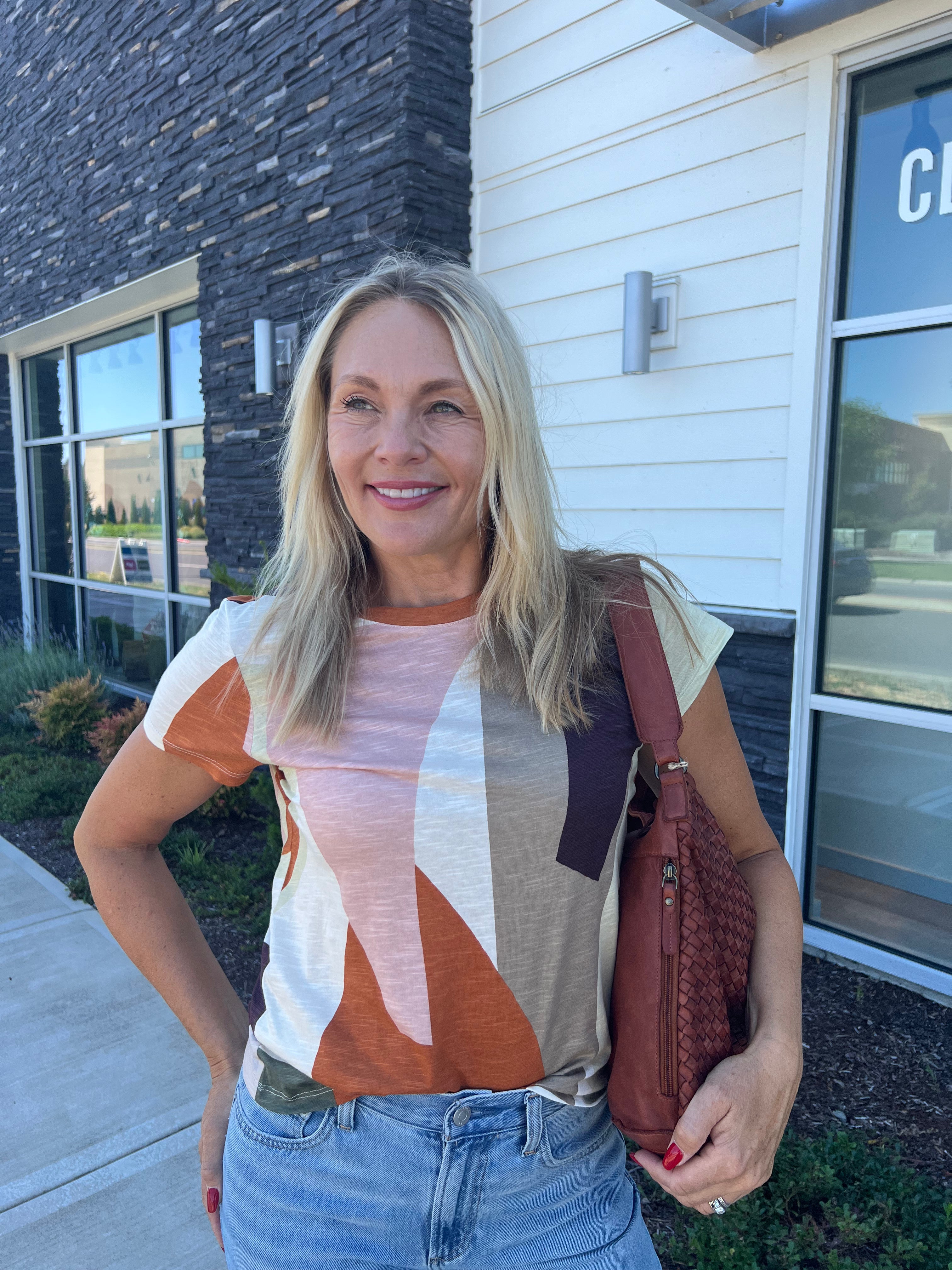 This tee is a great way to add a little print & novelty to any outfit! It's great to wear on it's own but also perfect for layering under jackets or sweaters!