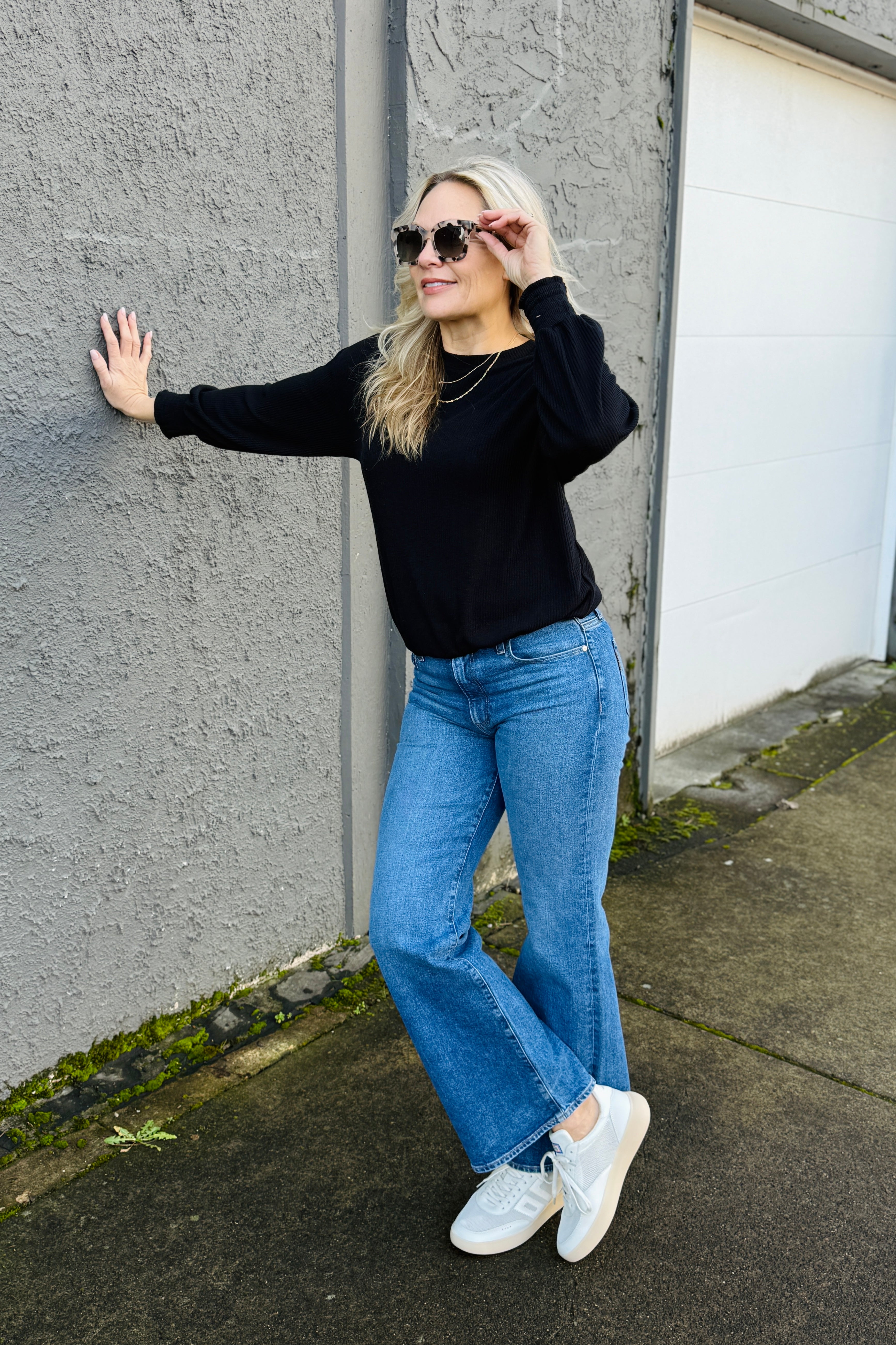 The Tia Ribbed Crew Sweatshirt combines textured ribbing with contemporary design details that elevate everyday comfort. Ruched sleeves add dimensional interest and a subtle gathered effect, while the fitted waistband creates a refined silhouette that transitions seamlessly into a bubble hem for modern movement and visual appeal. This piece balances structure with fluidity, making it an essential layer for versatile styling.