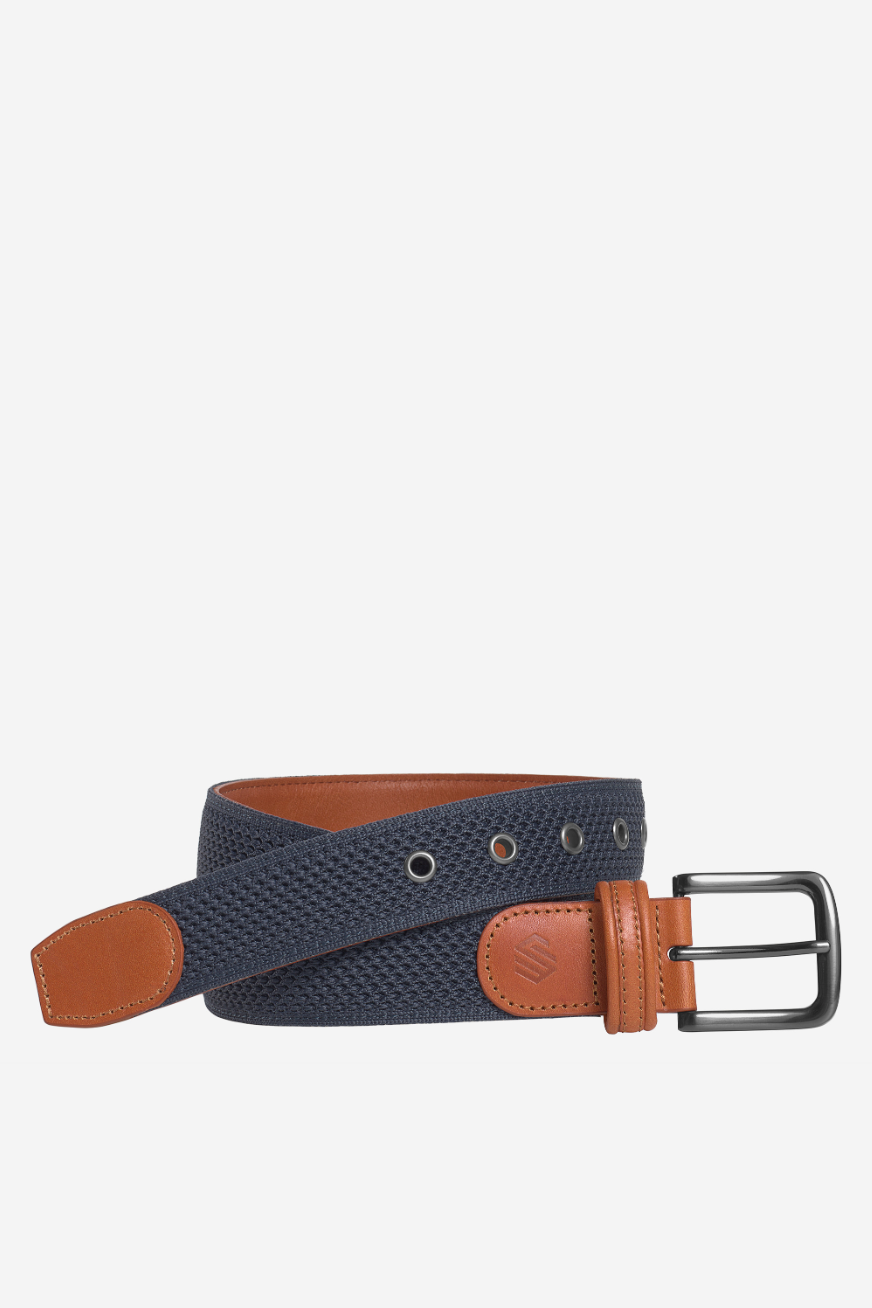 Johnston & Murphy Amherst knit belt in Navy, a hand-crafted knit belt with leather trim and a brushed nickel buckle that finishes off chinos or shorts for the golf course, the office, summer weddings and weekends