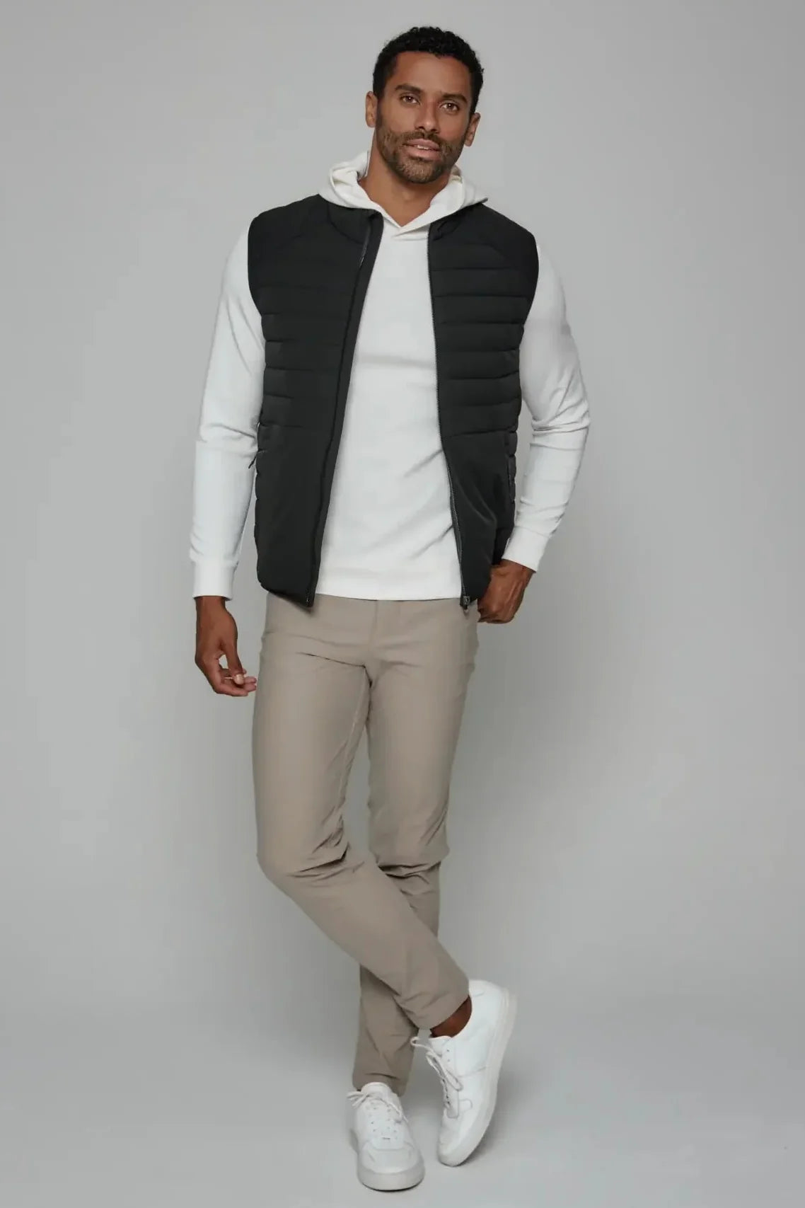 7 Diamonds Atlas vest in Black, a lightweight, easy-layering vest that adds warmth over a polo or quarter zip for golf mornings, travel days, the office and crisp fall weekends