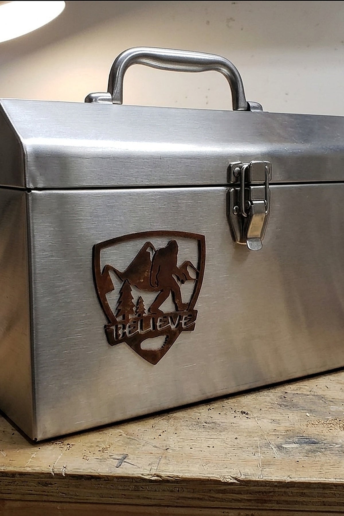 Paradise Cay Publications Bigfoot in Shield Believe magnet on a metal toolbox, a stone-tumbled laser cut steel Believe magnet for the toolbox, fridge or truck, and a fun gift for believers
