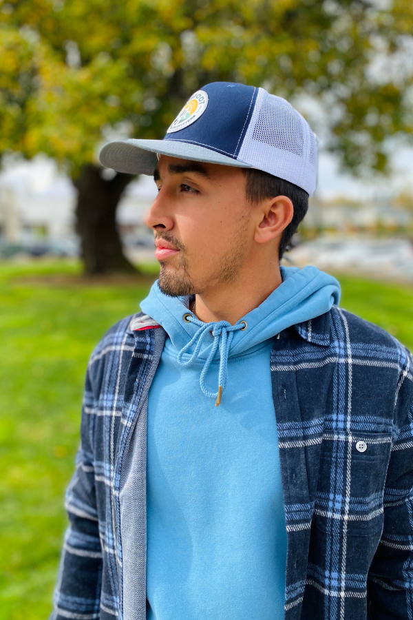 Bigfoot Mountain Outfitters original patch logo mesh back hat in Navy/Charcoal/White, a casual classic trucker hat for sunny days on the water, road trips, festivals and everyday wear