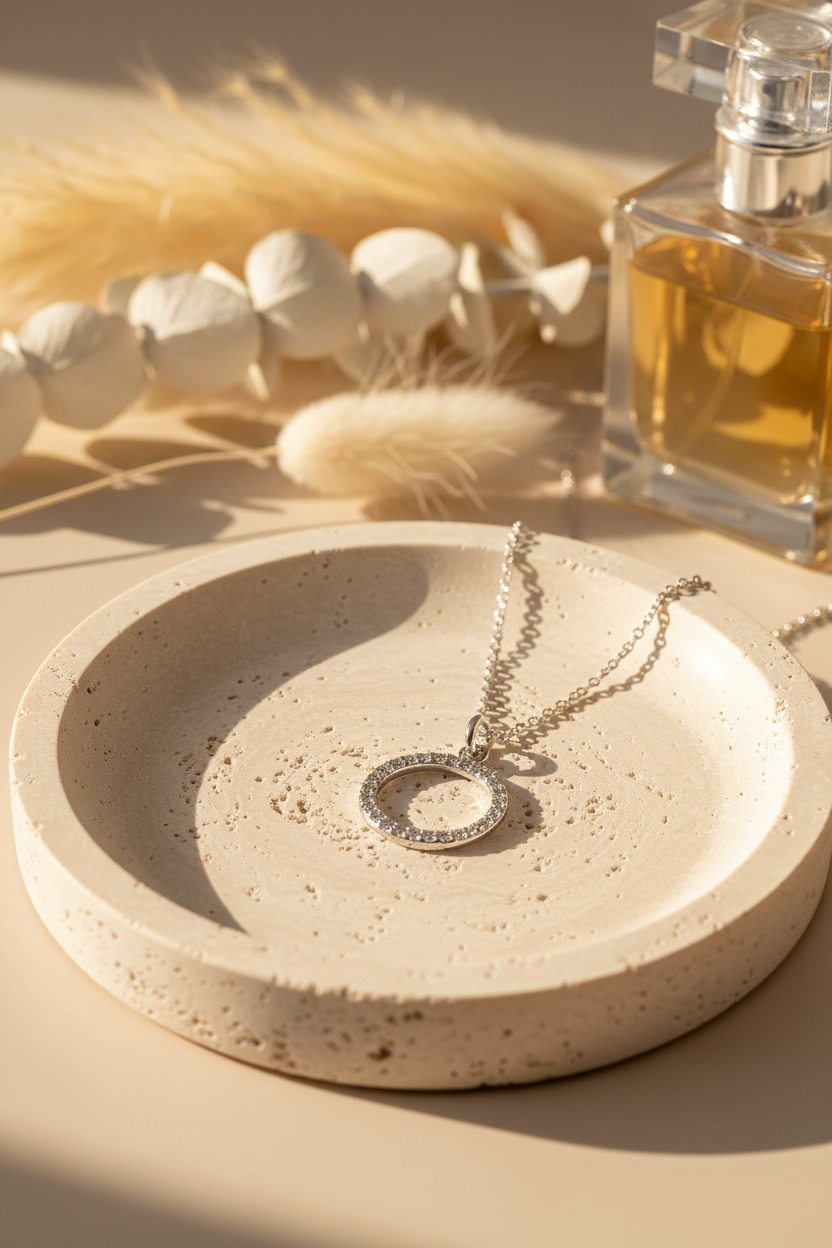 Silpada Brilliante Necklace draped on a travertine jewelry dish, perfect for layering, everyday wear and gifting
