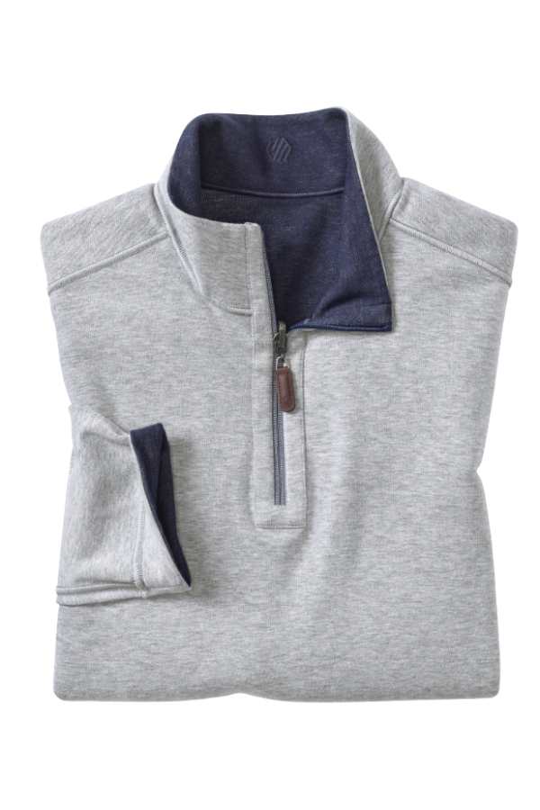 Johnston & Murphy Icon reversible quarter zip in Navy/Storm, a two-in-one pullover you can flip for a new look at the office, on the golf course or while traveling