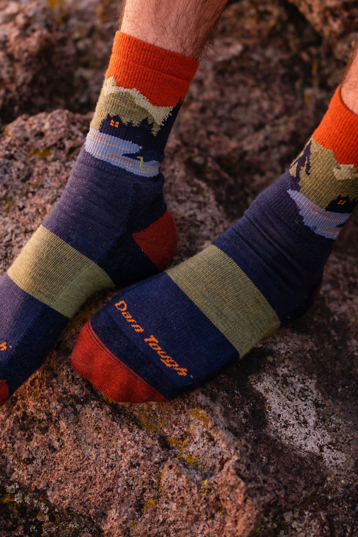 Darn Tough Men's Close Encounters Micro Crew Midweight Hiking Socks in Eclipse, a midweight cushioned merino hiking sock with a Bigfoot scene for hikes, camping and everyday wear with boots, a fun gift for outdoorsmen, guaranteed for life